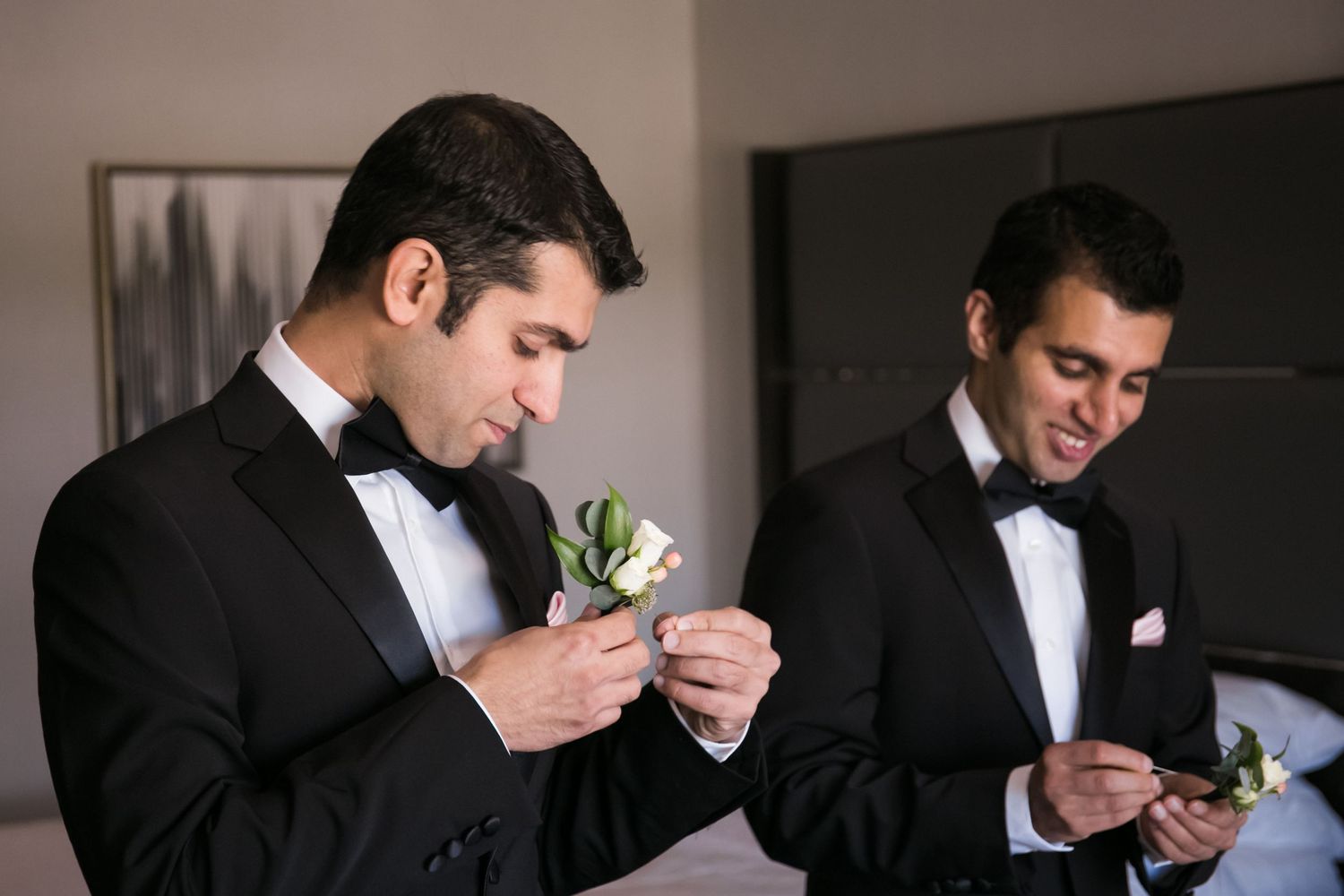 Groomsmen in black tuxedos pinning boutonnieres before the ceremony, Hilton Garden Inn Foxborough Patriot Place, MA