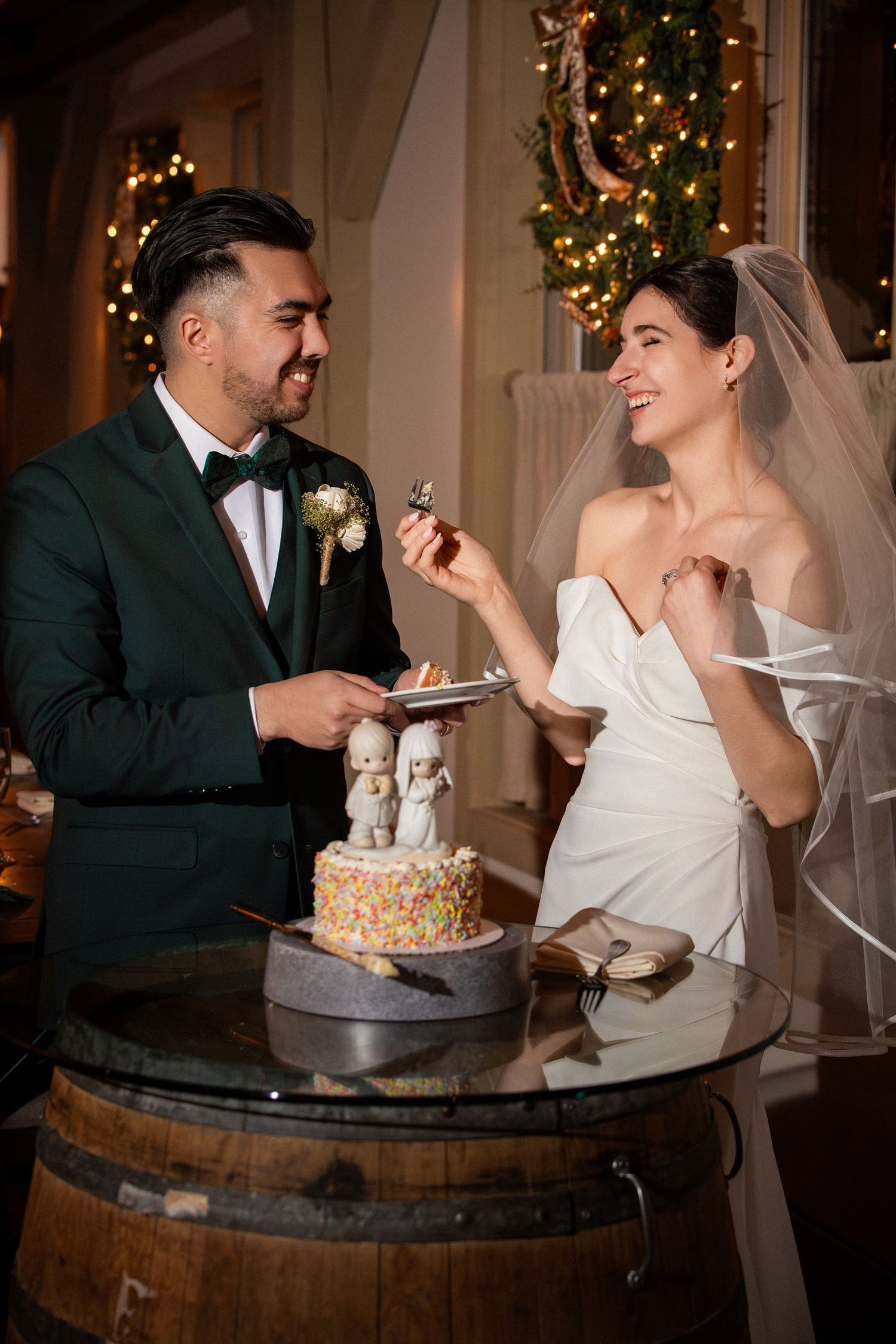 Joyful couple cutting colorful sprinkle wedding cake at festive winter-themed reception, Grove at Briar Barn Inn, Rowley, MA