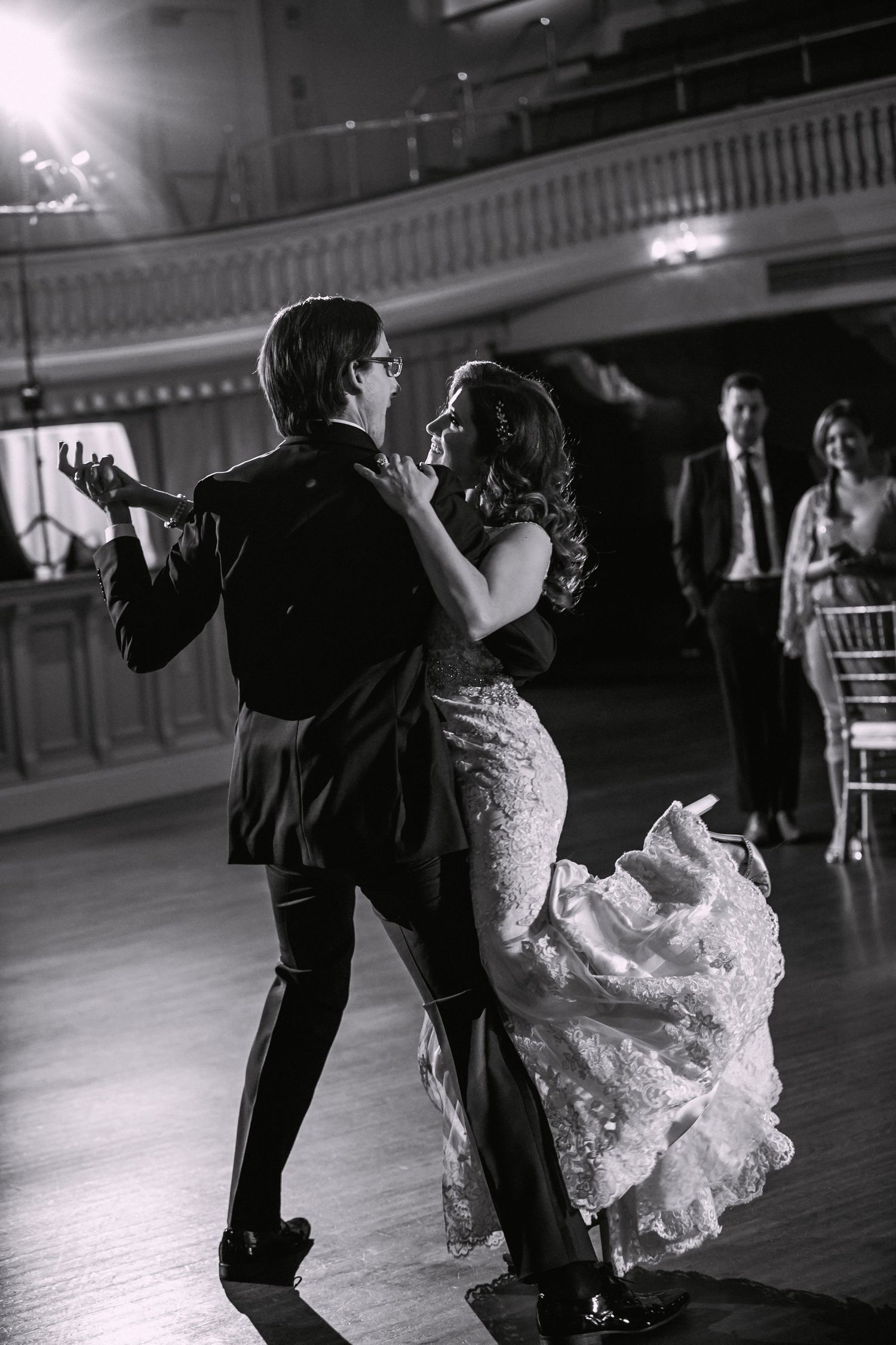 Black and white photo of bride and groom's first dance in the ornate ballroom, Mechanics Hall, Worcester, MA