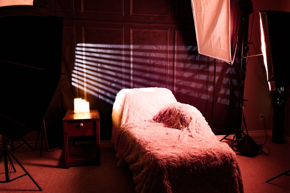 Inside the private Rab Carrigan Photography studio in Barrie: a secure, closed-set sanctuary with a chaise lounge
