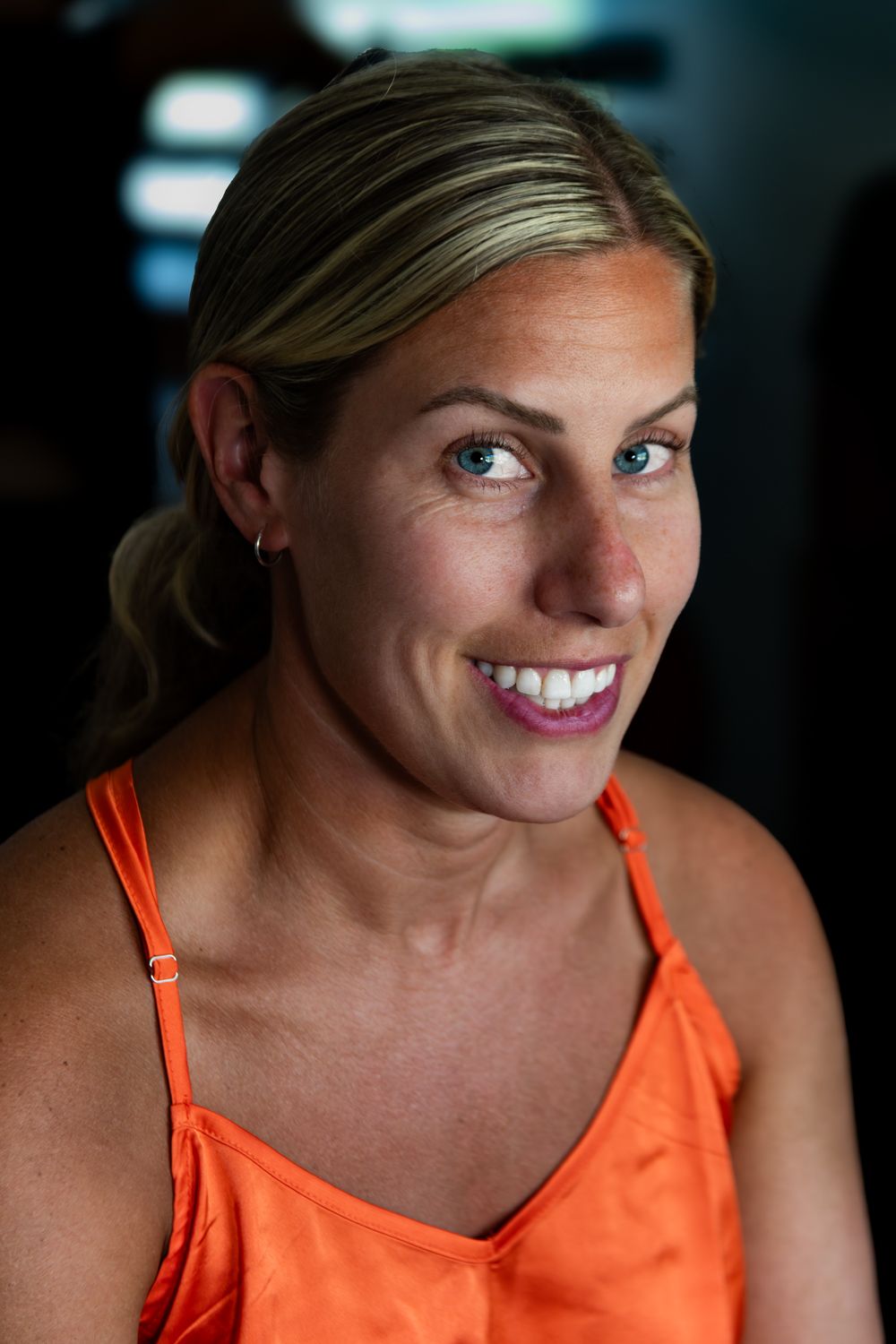 Natural light headshot example: used as a before image to show the limits of flat lighting in professional portraits.