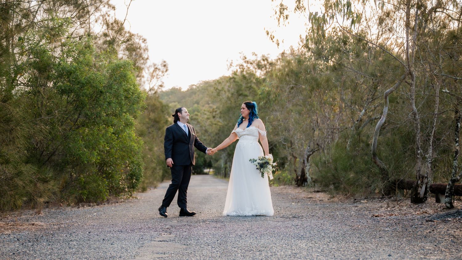 Golden hour wedding portraits at Fleays Wildlife Park with Wonderland Photography