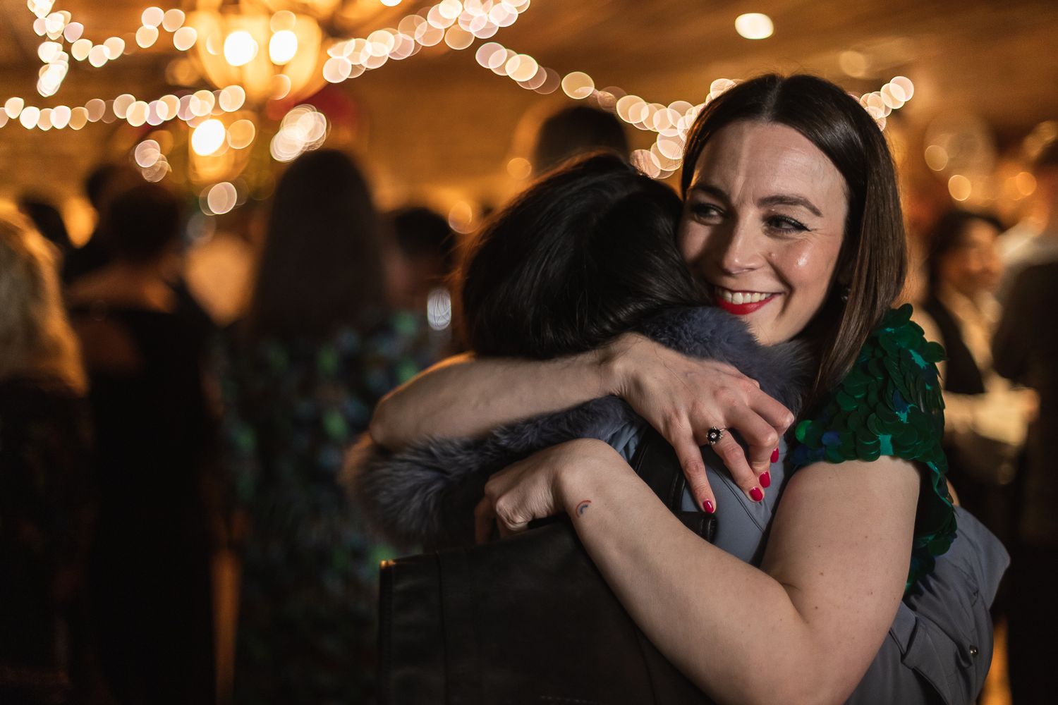 A hug between the birthday girl and a guest at her 40th Birthday party in North London.