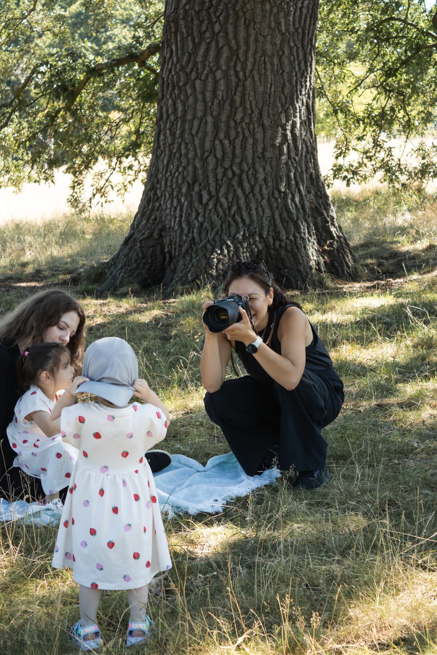 Some behind the scenes of me photographing a young family on an outdoor shoot.