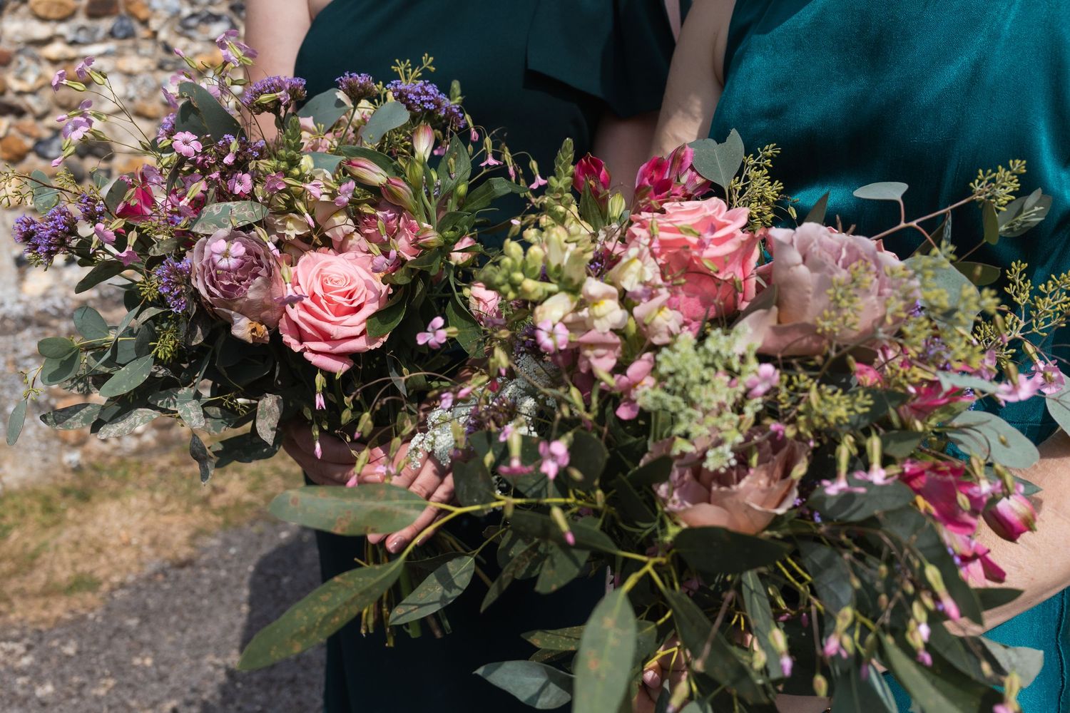 Bridal and bridesmaid bouquet of flowers outside the church, ahead of the ceremony in Stevenage, Hertfordshire.