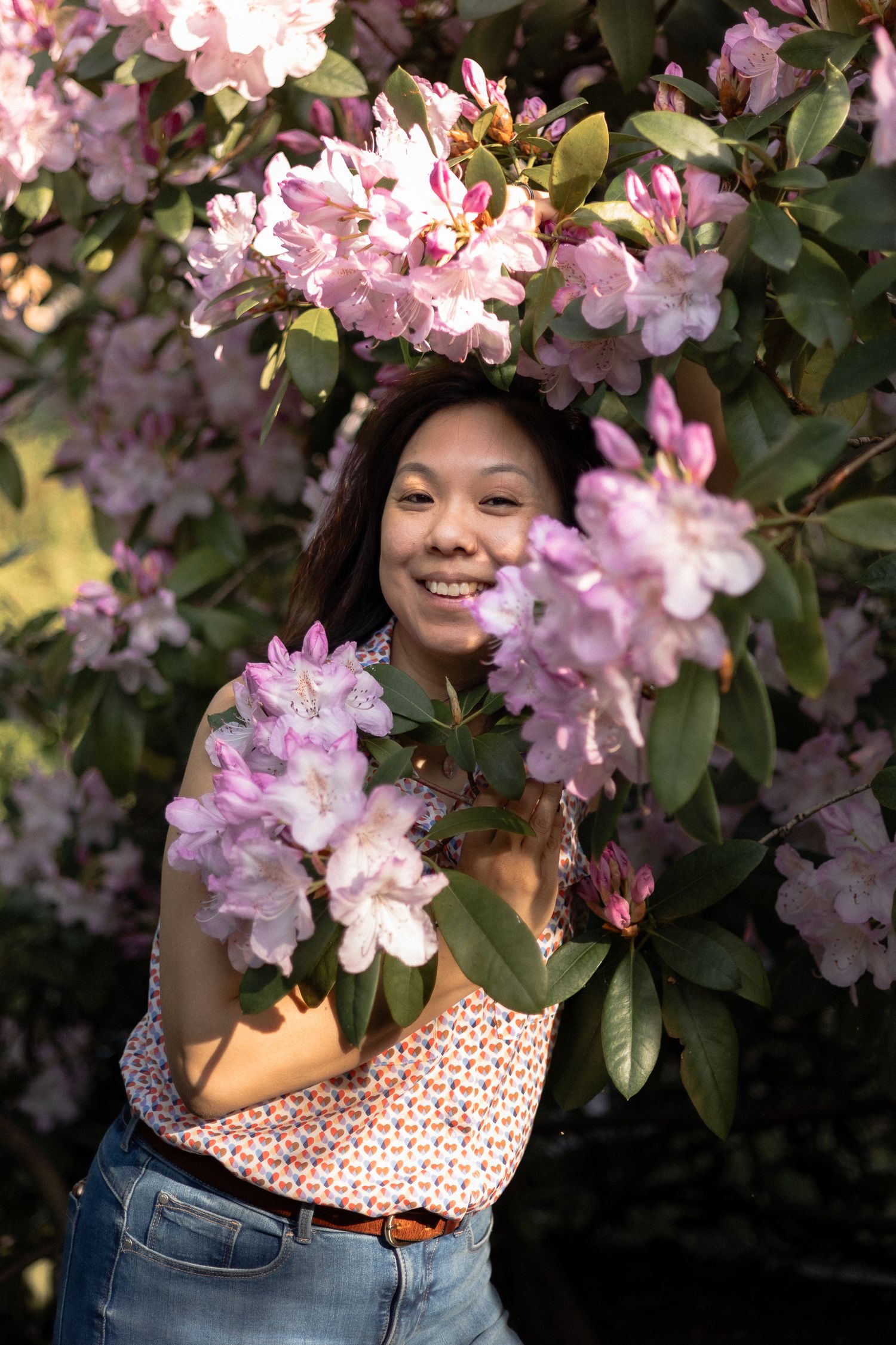 Relaxed and chilled self portrait of me standing within the pink blossom.