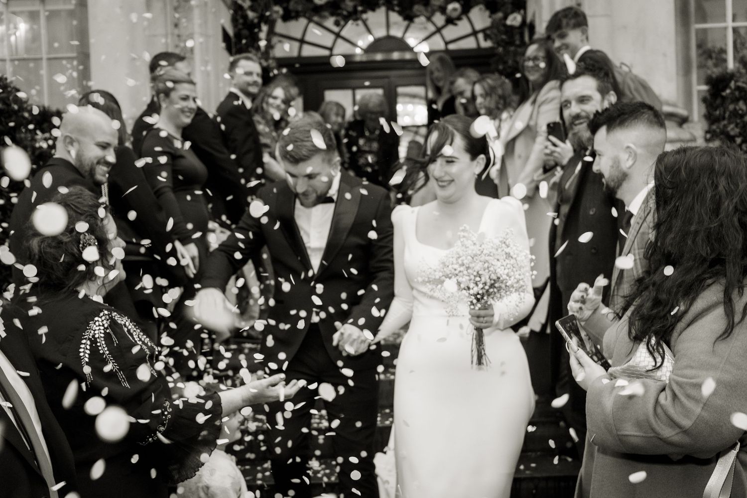 Black and white confetti shot outside Chelsea Old Town hall.