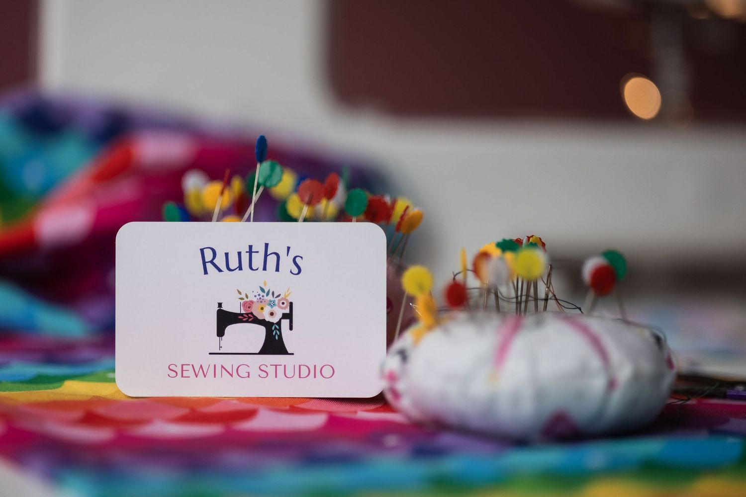 Creative photo of business cards for Ruth's sewing studio taken by Jane Nicholson Photography.