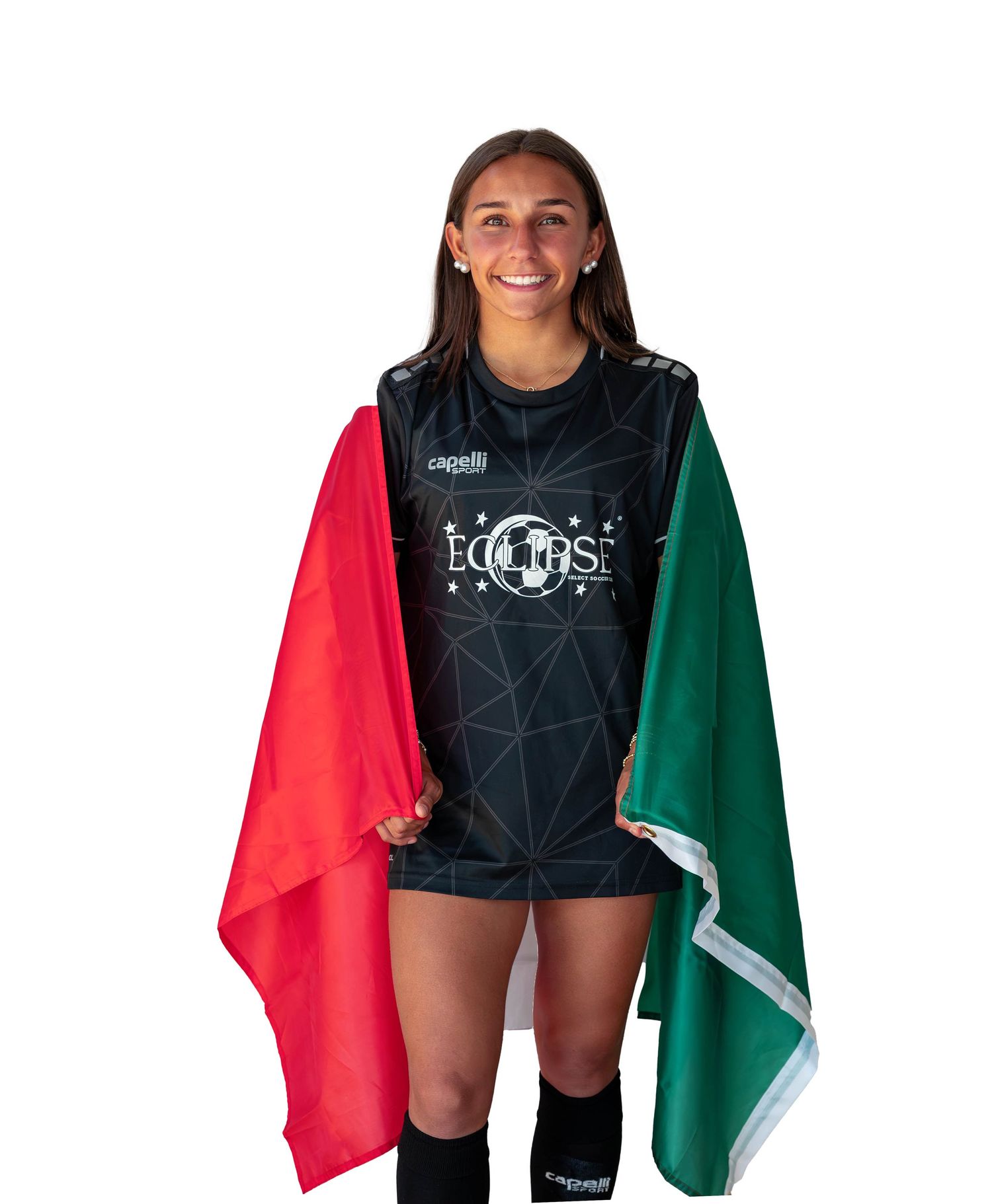 Athlete with long dark hair wearing black jersey stands draped in red and green team flag colors.