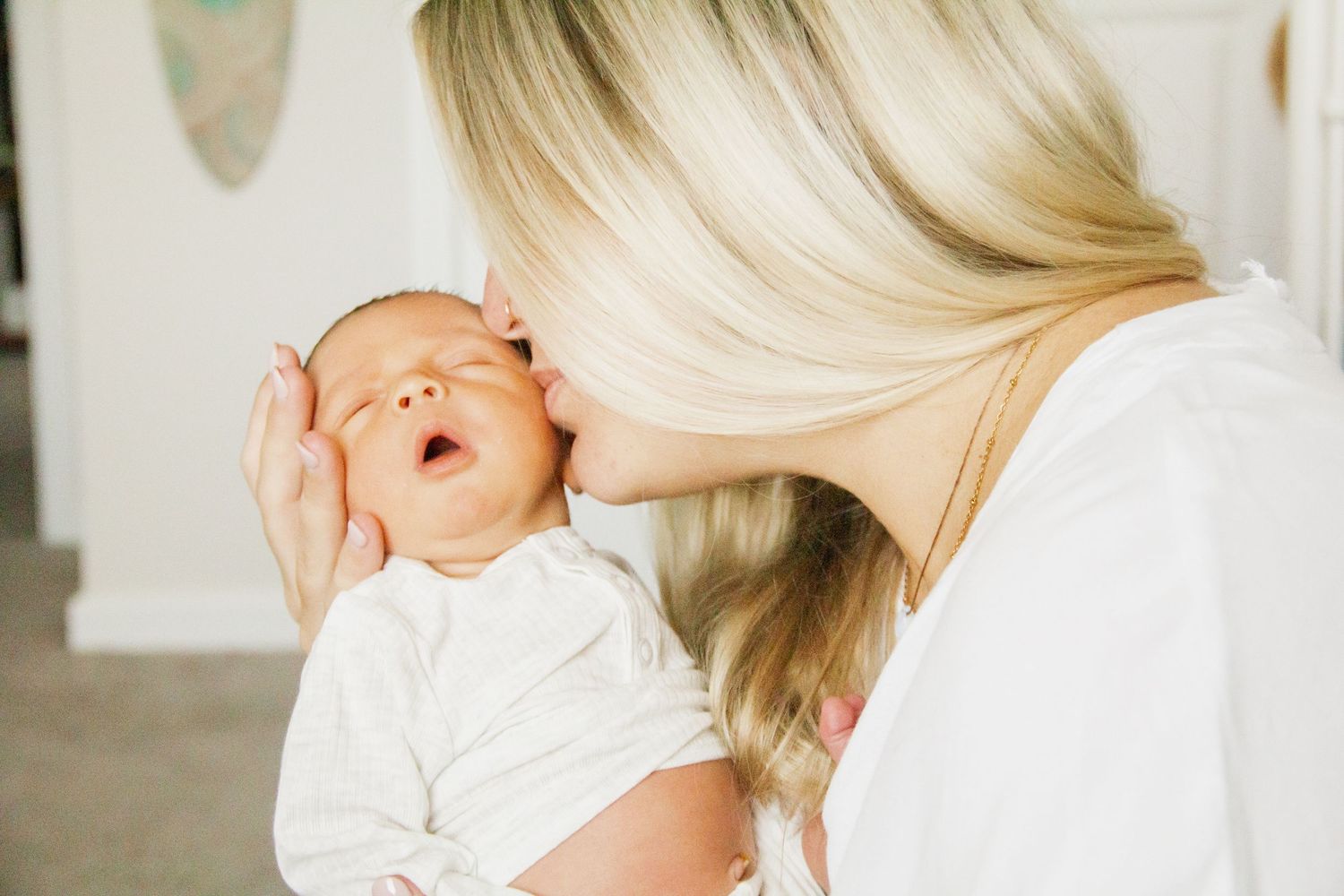 Newborn snuggles in the nursery