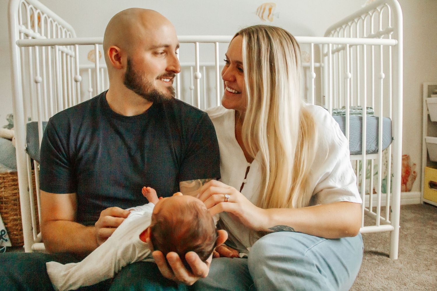 Newborn snuggles in the nursery