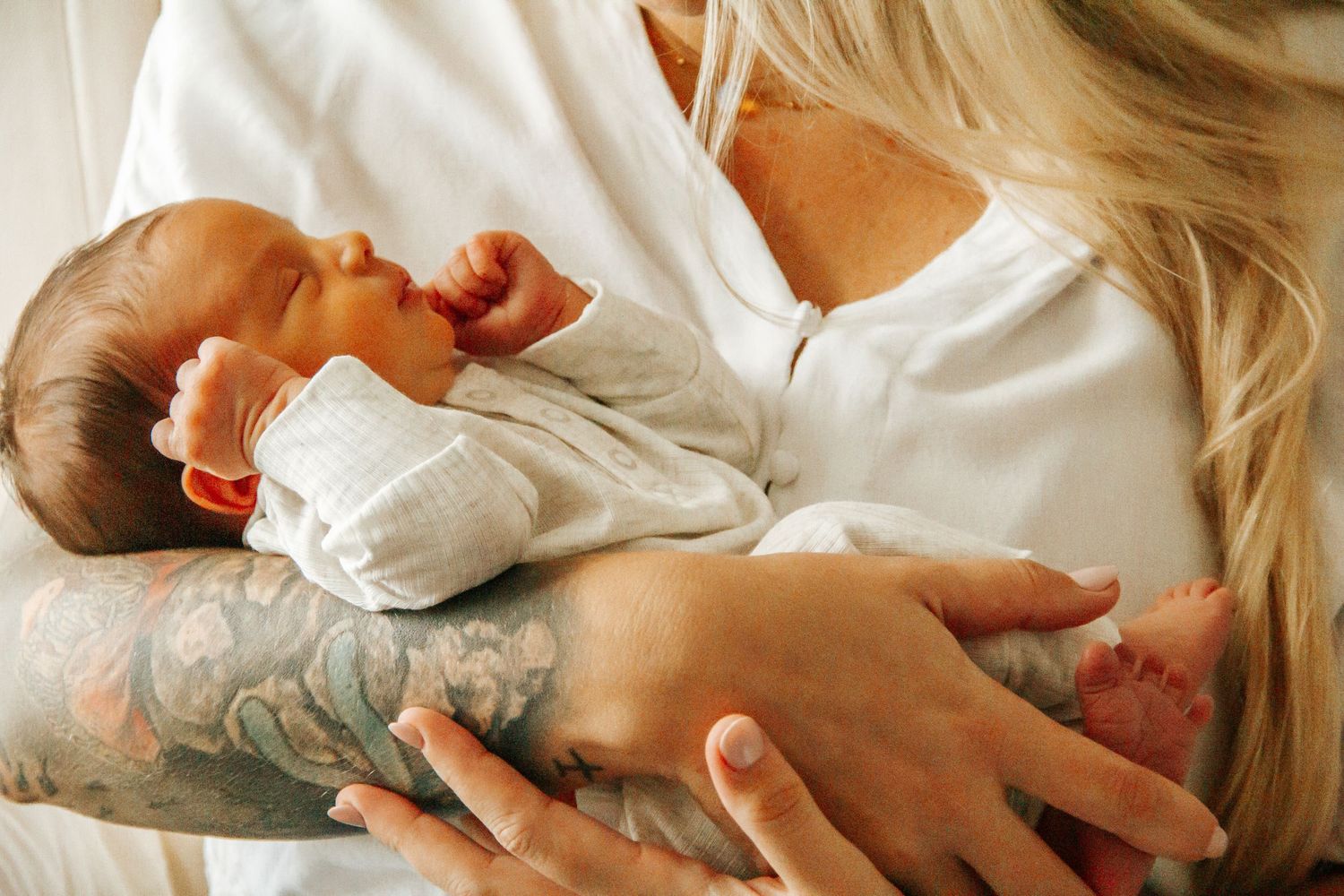 Newborn snuggles in the nursery