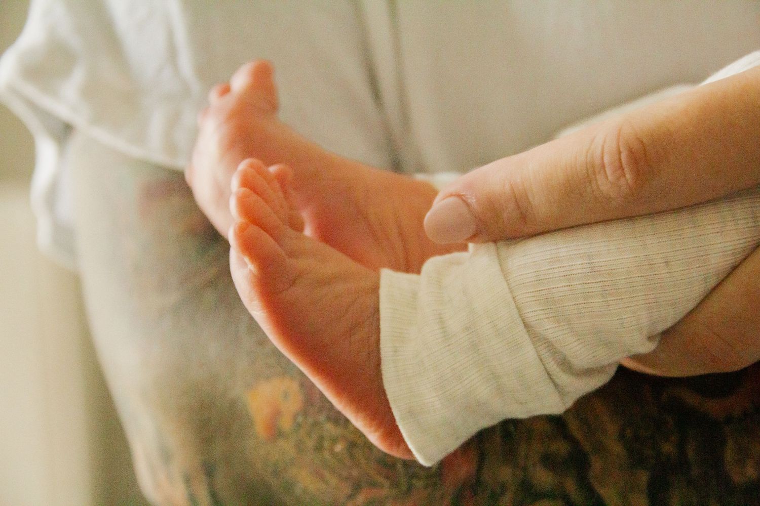 Newborn snuggles in the nursery