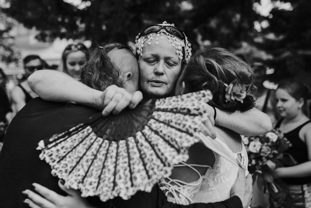 Vintage black and white photograph of traditional folk dancers performing with decorative fans.