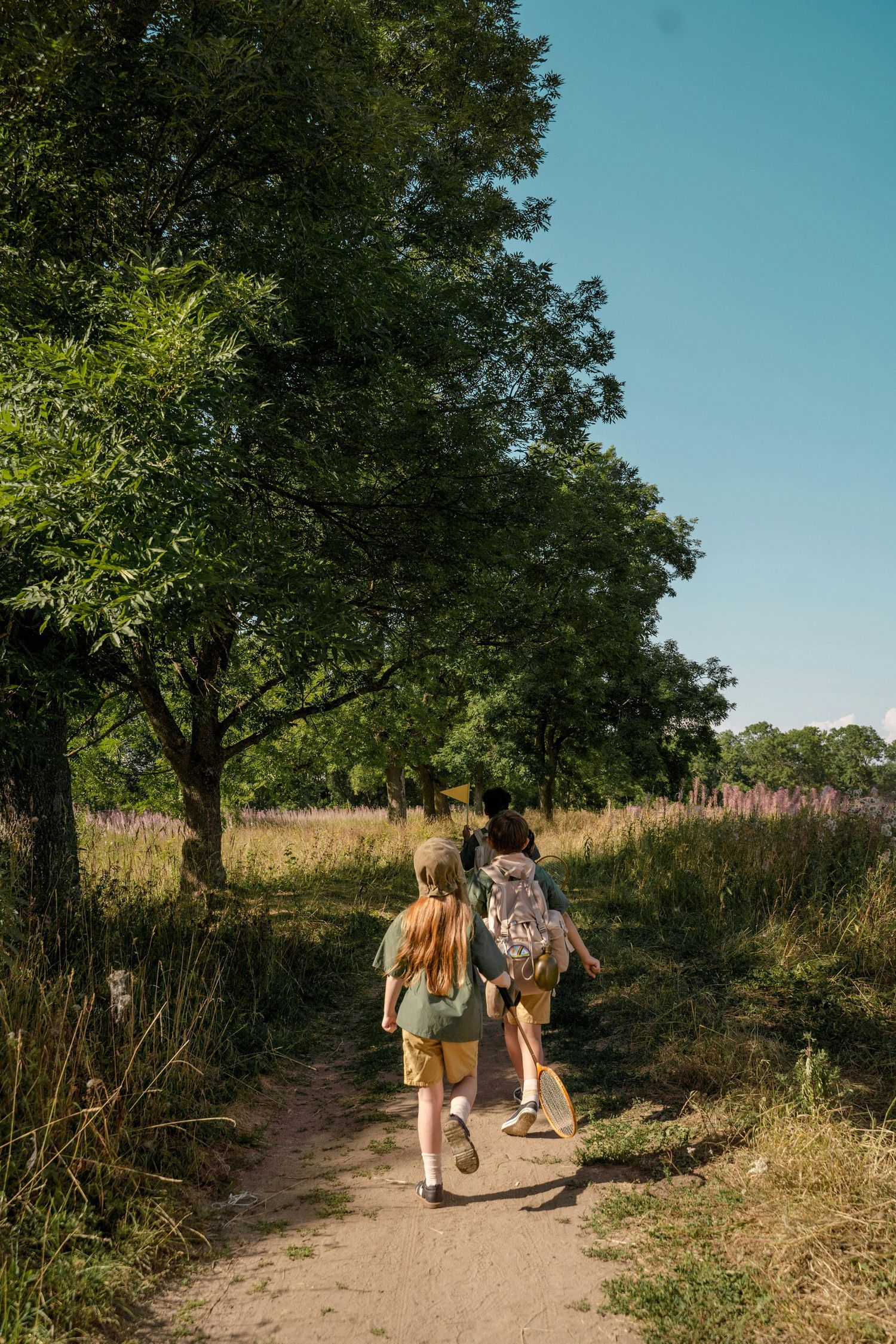 Kids walking on a trail