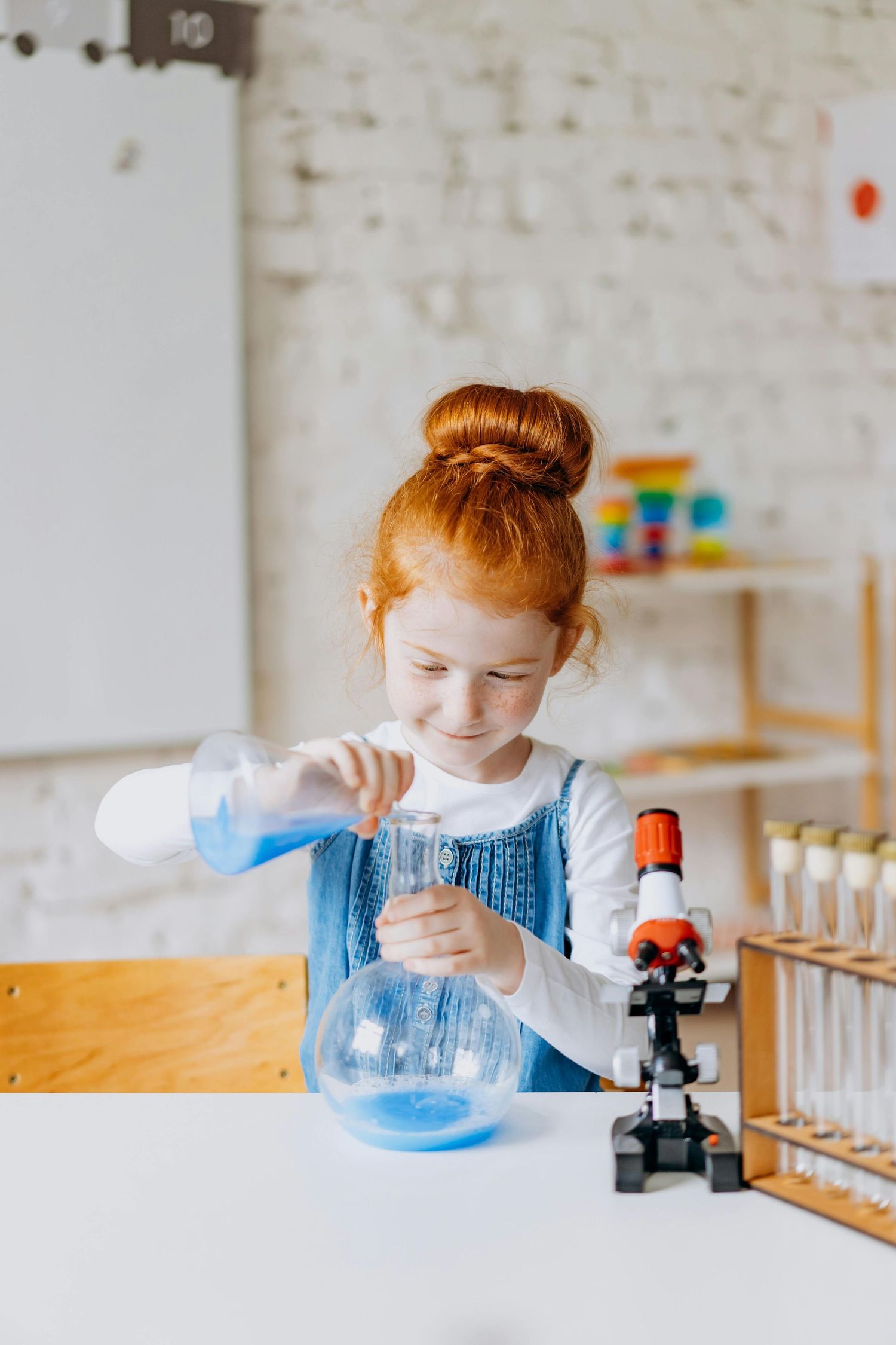 Kid doing a science experiment