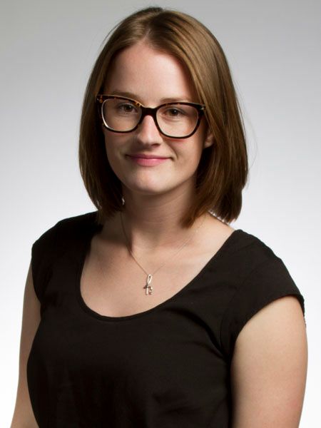 Professional headshot series showing different expressions against a light gray background.