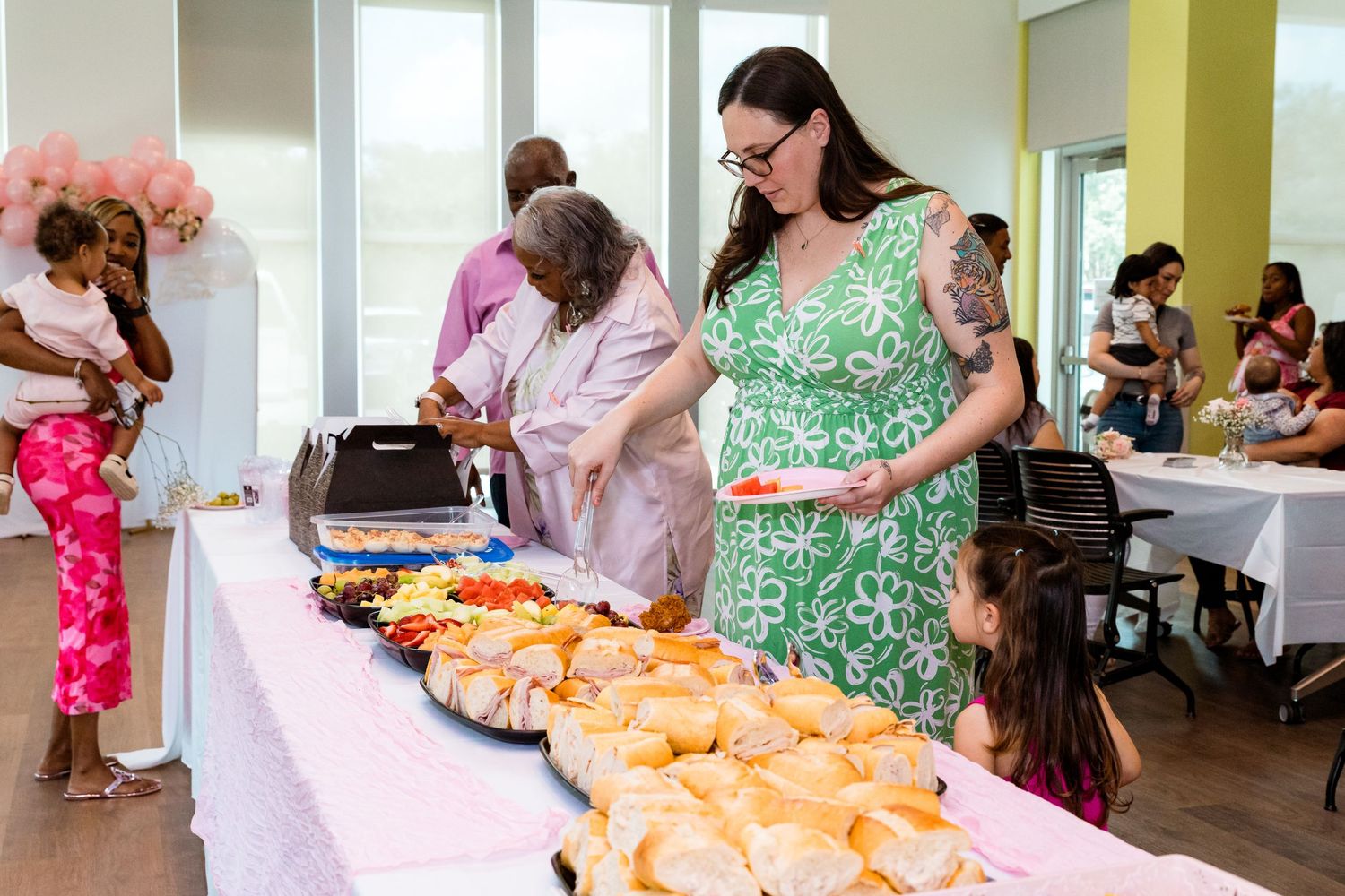 Buffet table with food service setup at a party or celebration event.