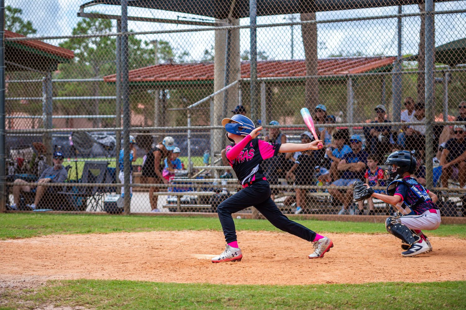 A sequence of baseball action shots showing batting, catching, and fielding plays on a sunny day at the ballpark.