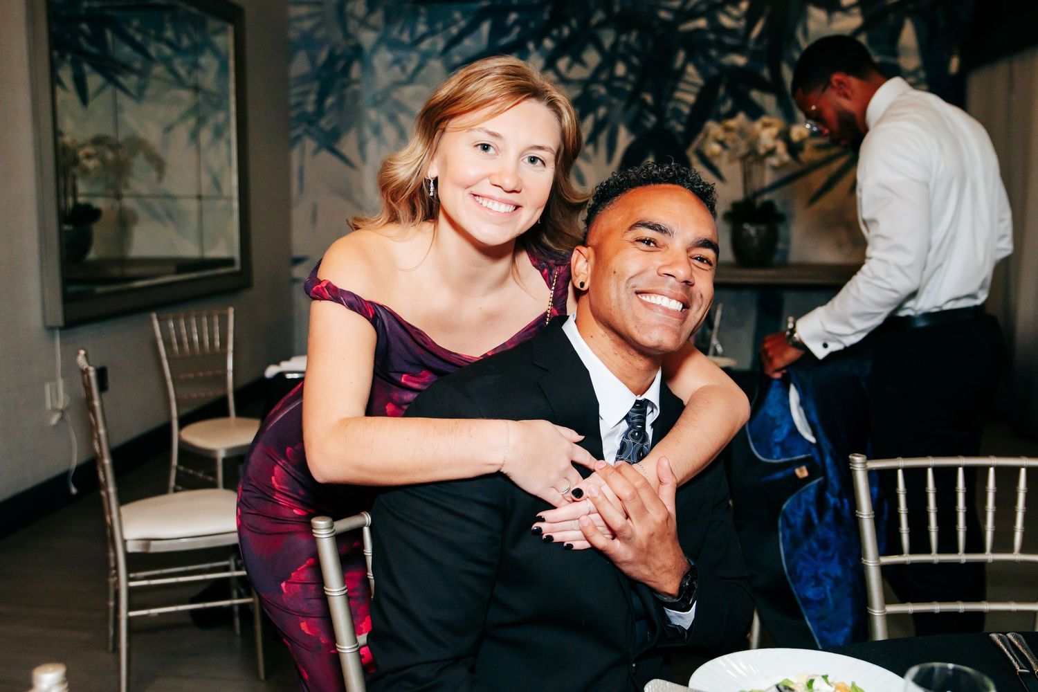 Candid moments of guests dancing and celebrating at formal evening reception.