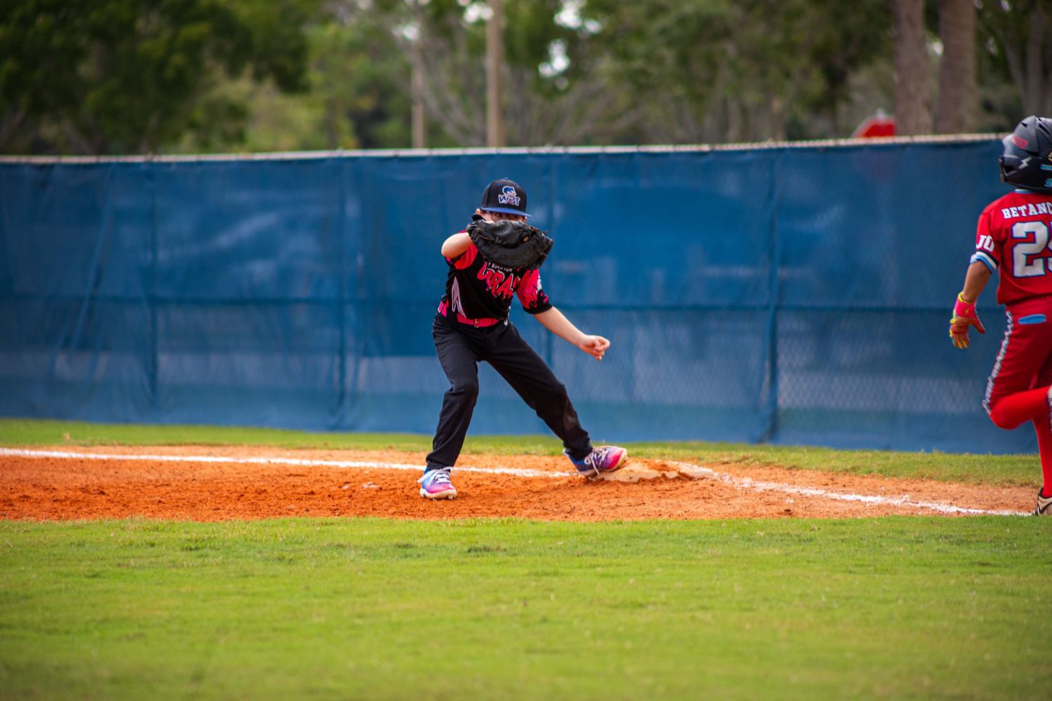 Baseball field action shots showing players in motion during competitive gameplay.