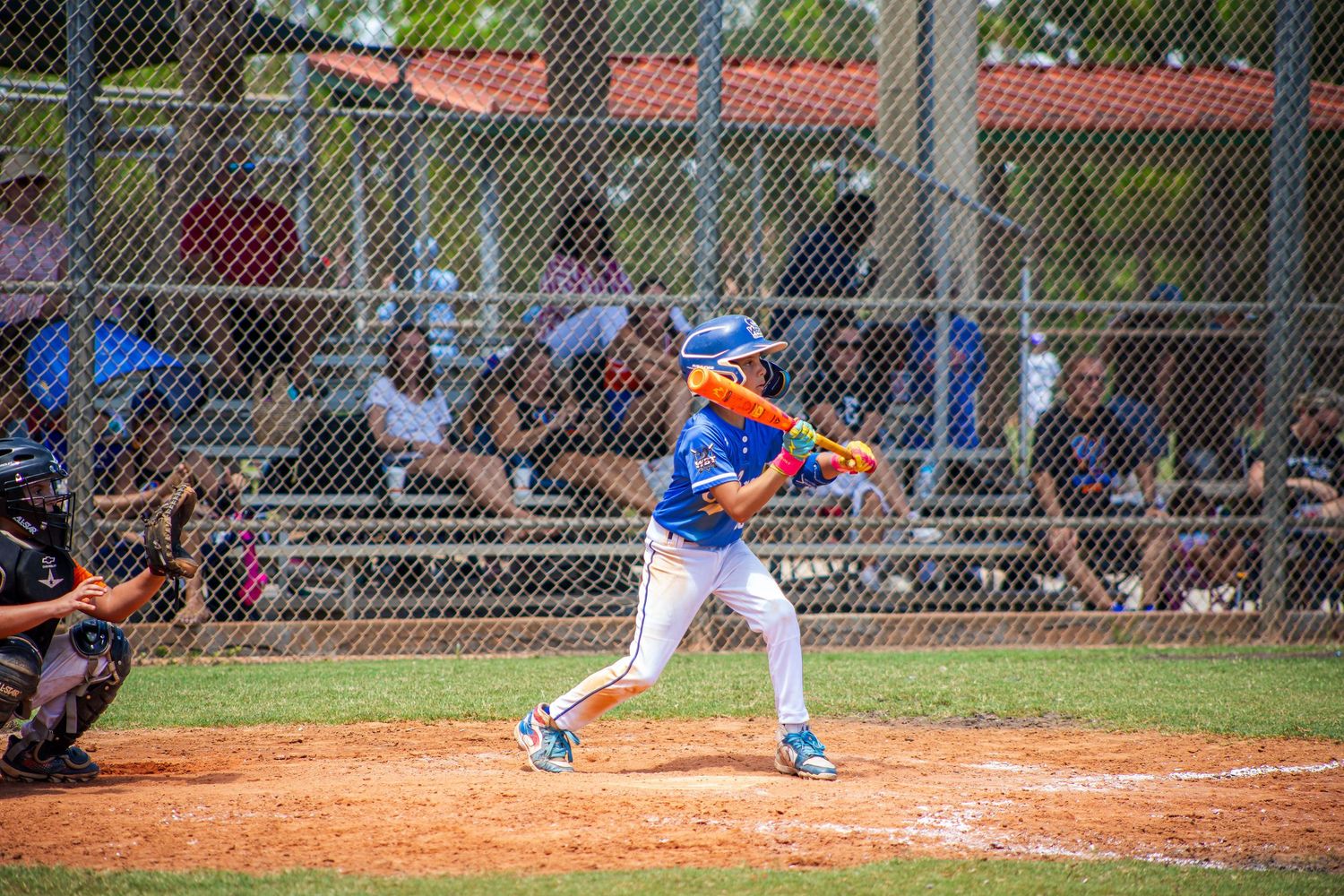 A series of baseball players in action shots showing batting stances, pitching motions, and fielding positions on a diamond.