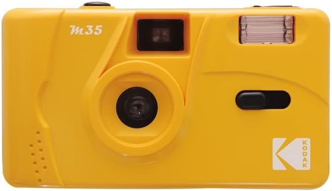 Kodak M35 yellow 35mm film camera with built-in flash and classic retro design.