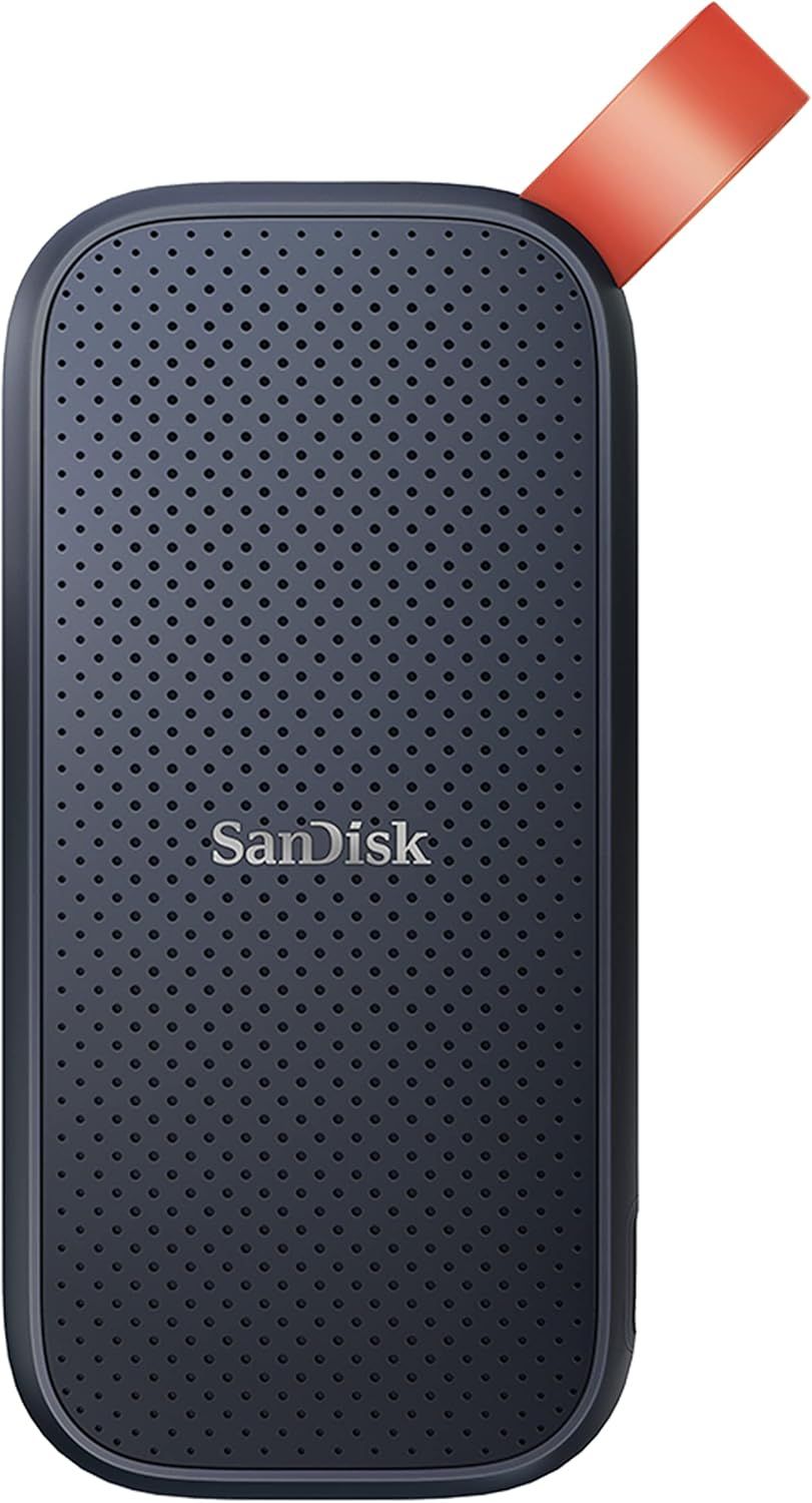 SanDisk portable SSD external hard drive in dark navy blue with red lanyard loop and textured dot pattern surface.