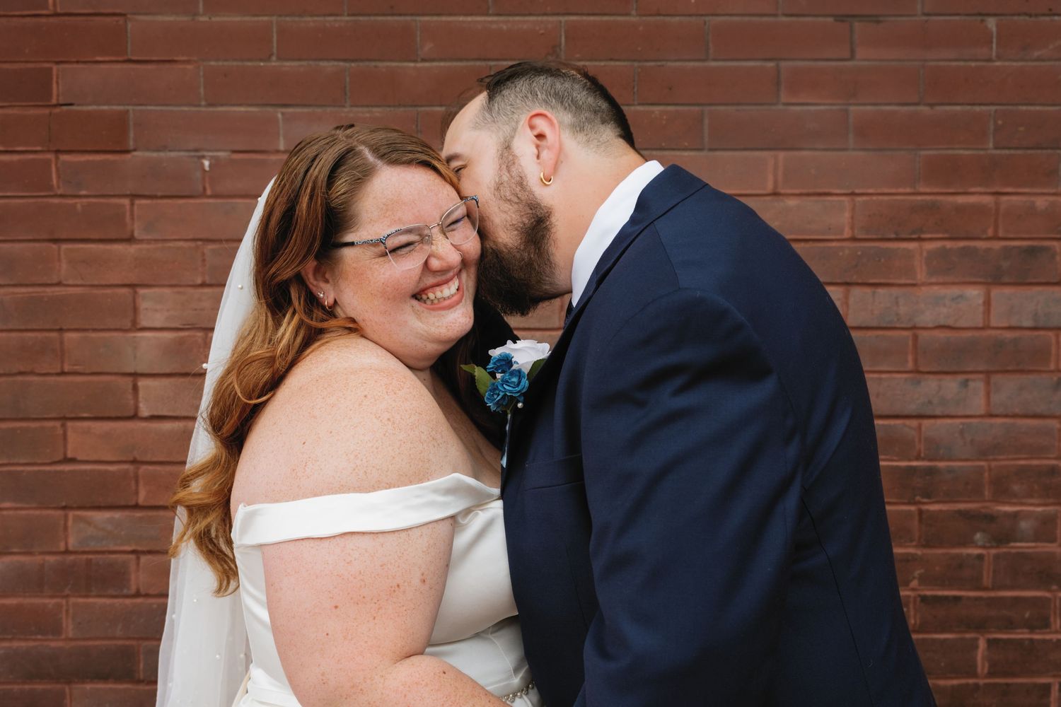 Romantic wedding photo collage showing tender moments between newlyweds against a rustic brick wall backdrop.