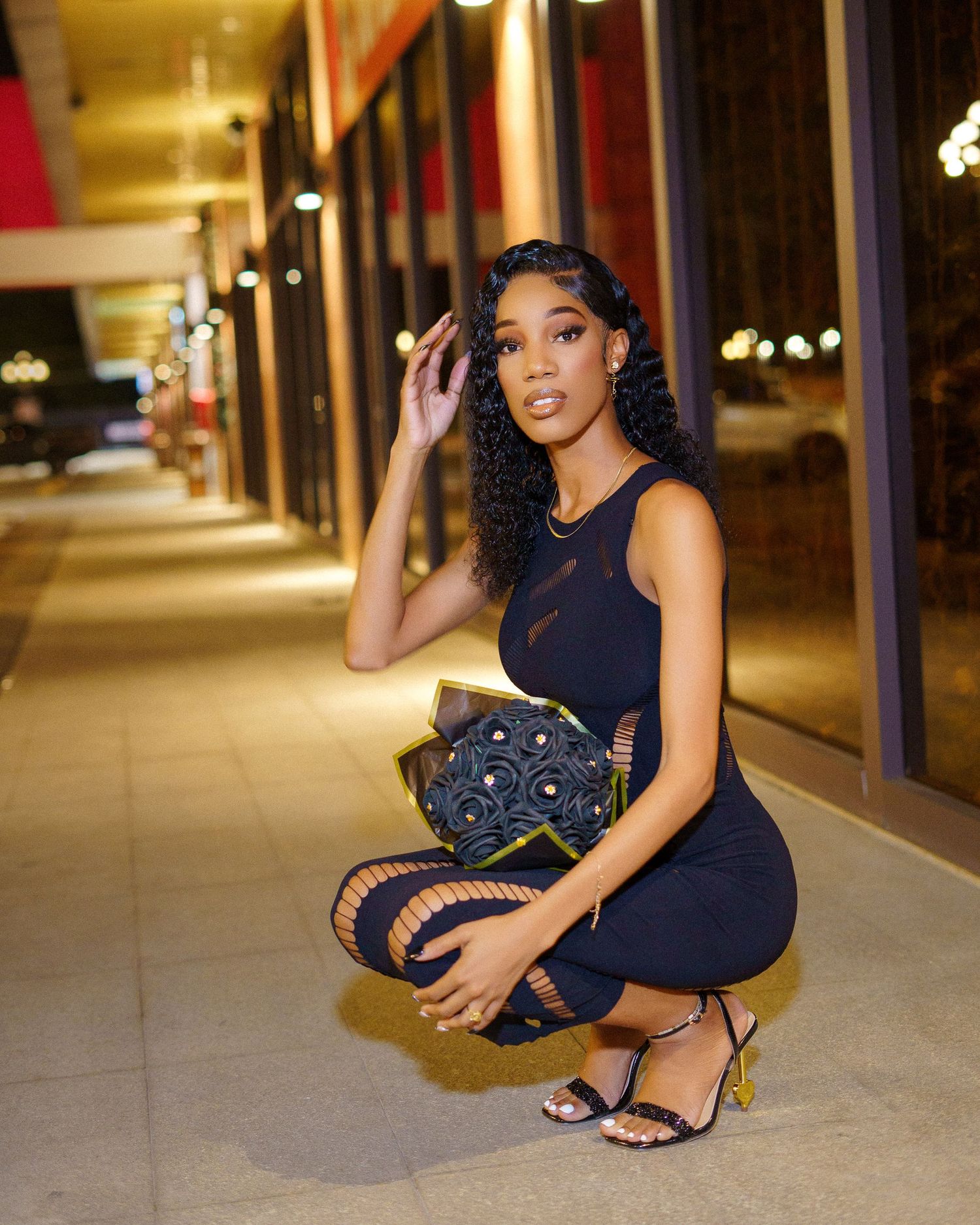 Fashion photography session showcasing evening wear and accessories.