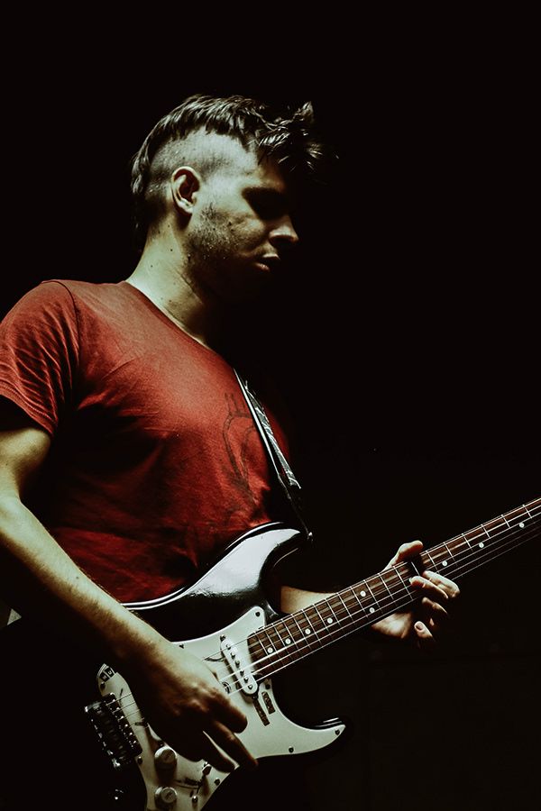 musician performing with guitar in Berlin