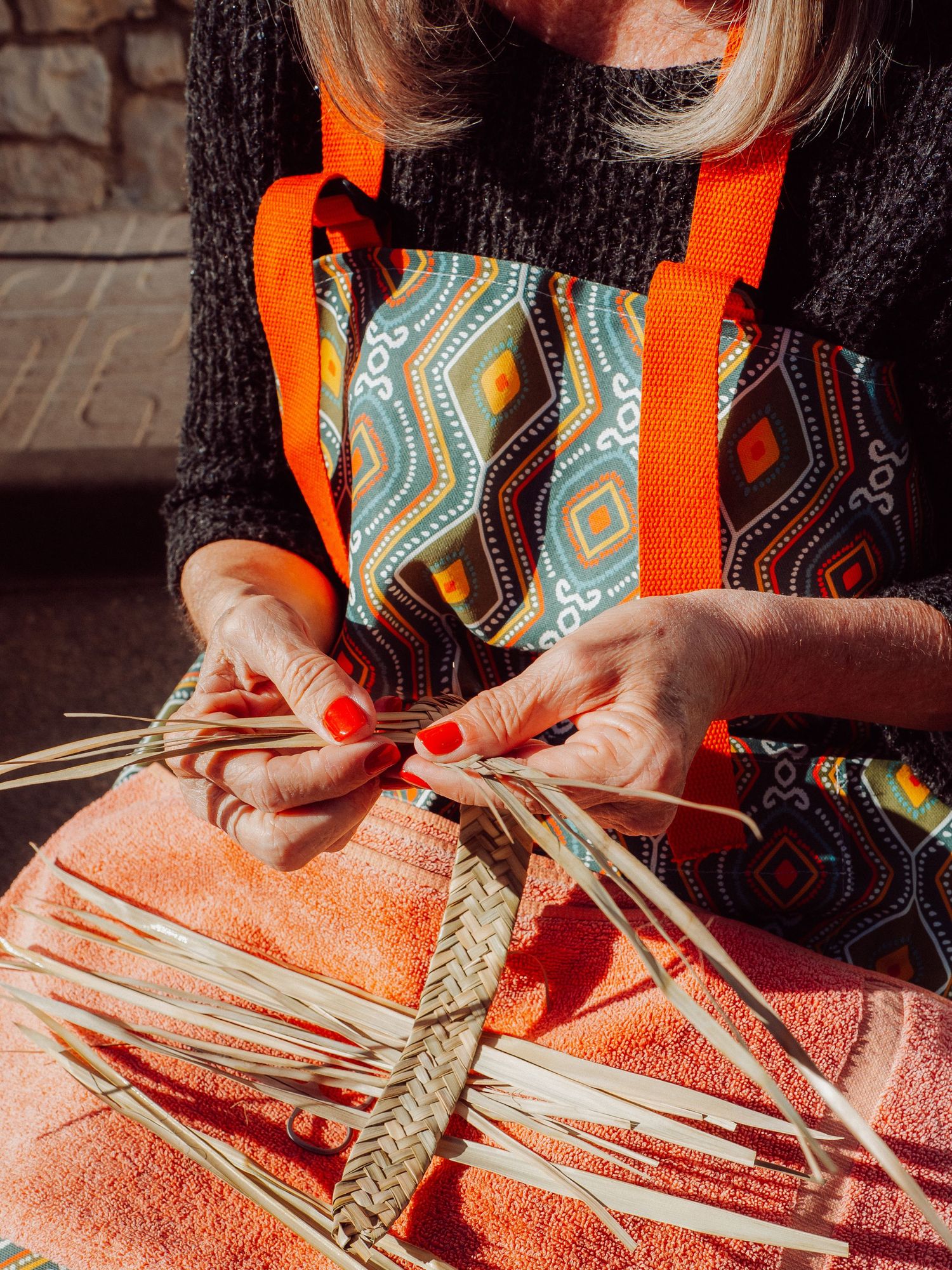 skilled hands carving wicker baskets, traditional iata of Marina Alta