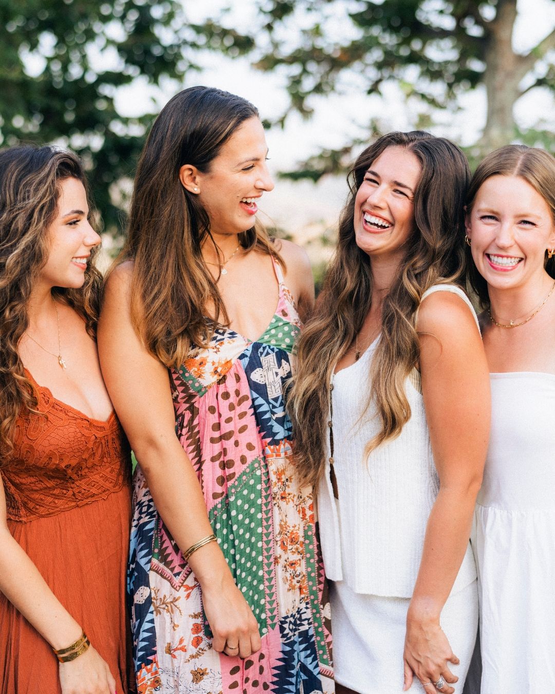 Three women enjoying a Southern California lifestyle event, photographed by Makenzie Rae Photography, Orange County California photographer