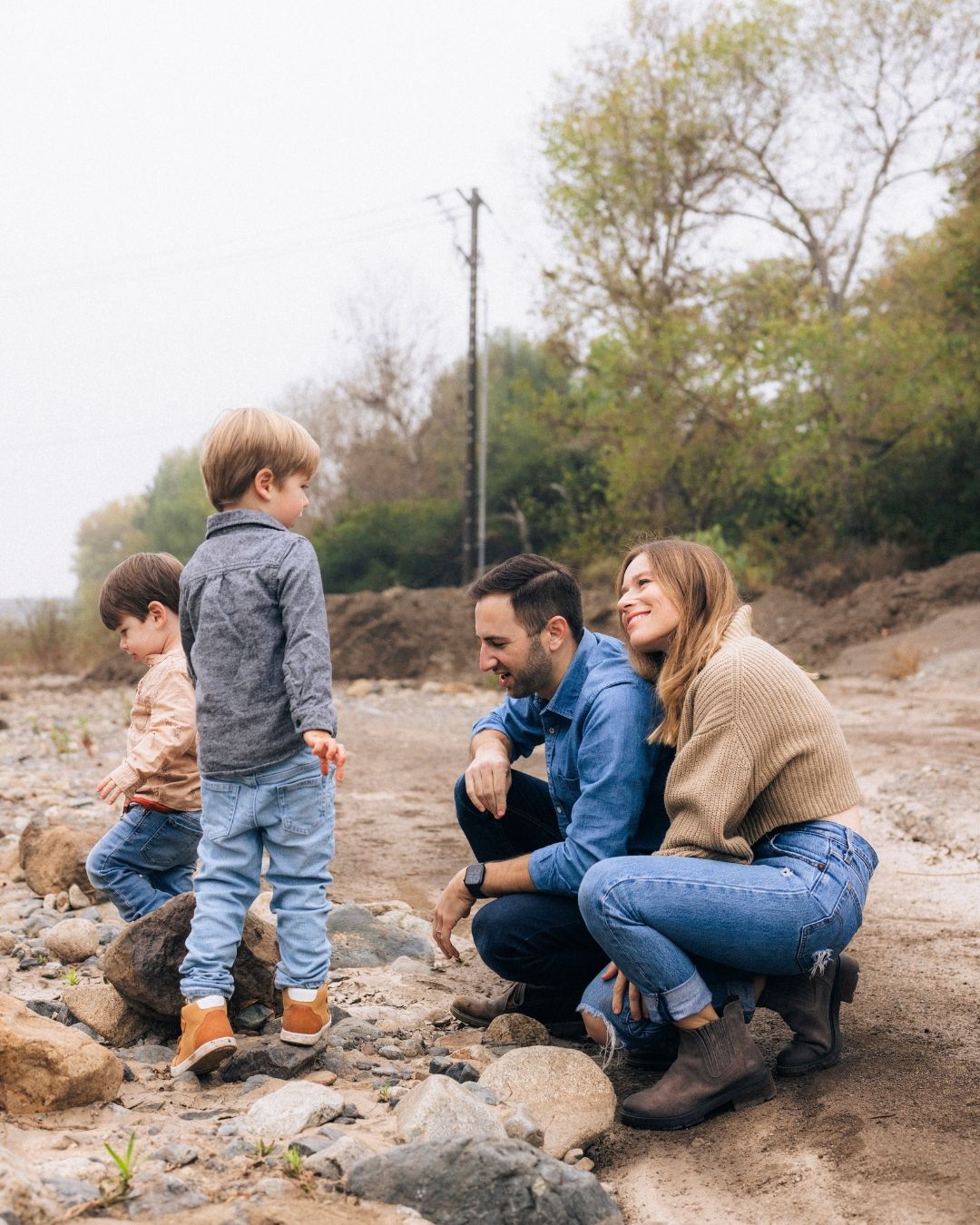 Family portrait with multiple children in a natural outdoor setting in Orange County by Makenzie Rae Photography, Orange County California p