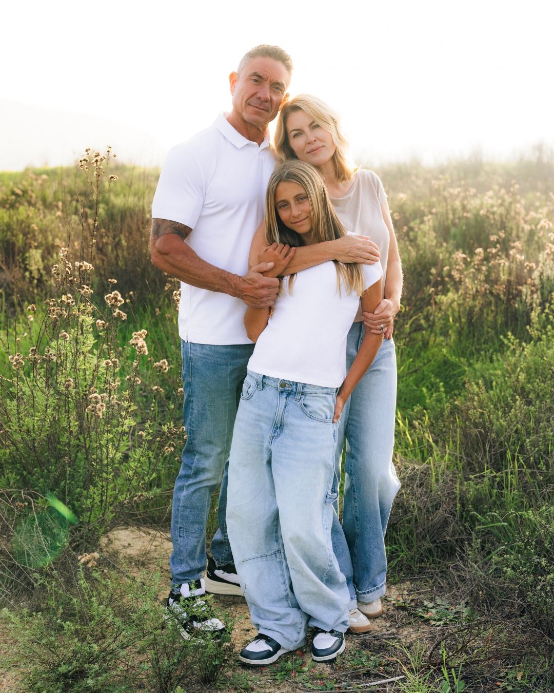 Family with young child at an outdoor portrait session in Southern California, photographed by Makenzie Rae Photography, Orange County Ca