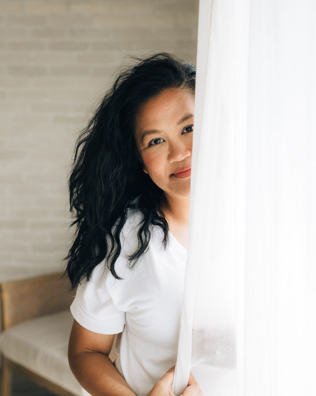 Woman's portrait in a bright indoor setting, South Orange County, photographed by Makenzie Rae Photography, lifestyle and portrait photograp