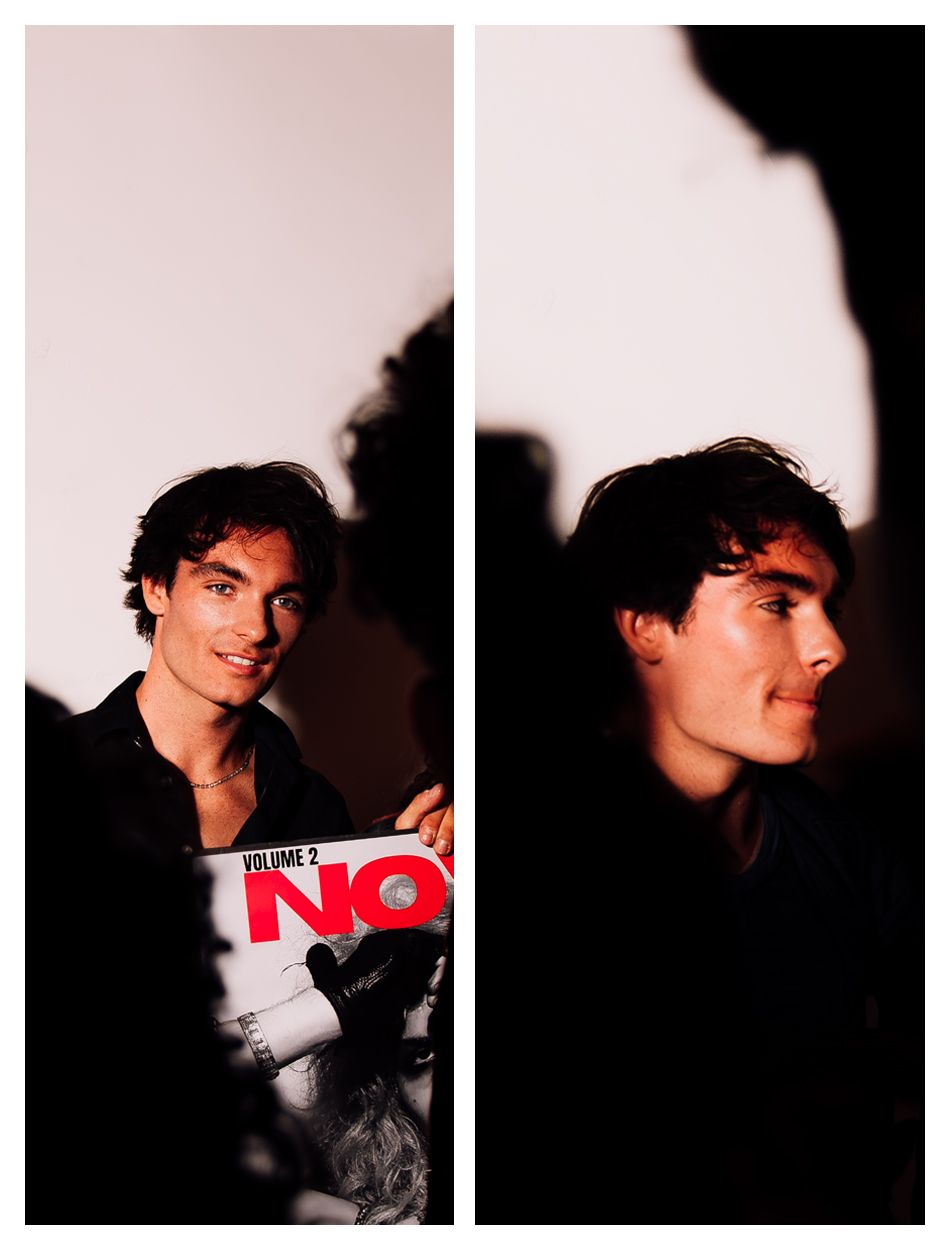 Diptych of a dark-haired man smiling while holding a Volume 2 NO magazine, shown in profile and front view.