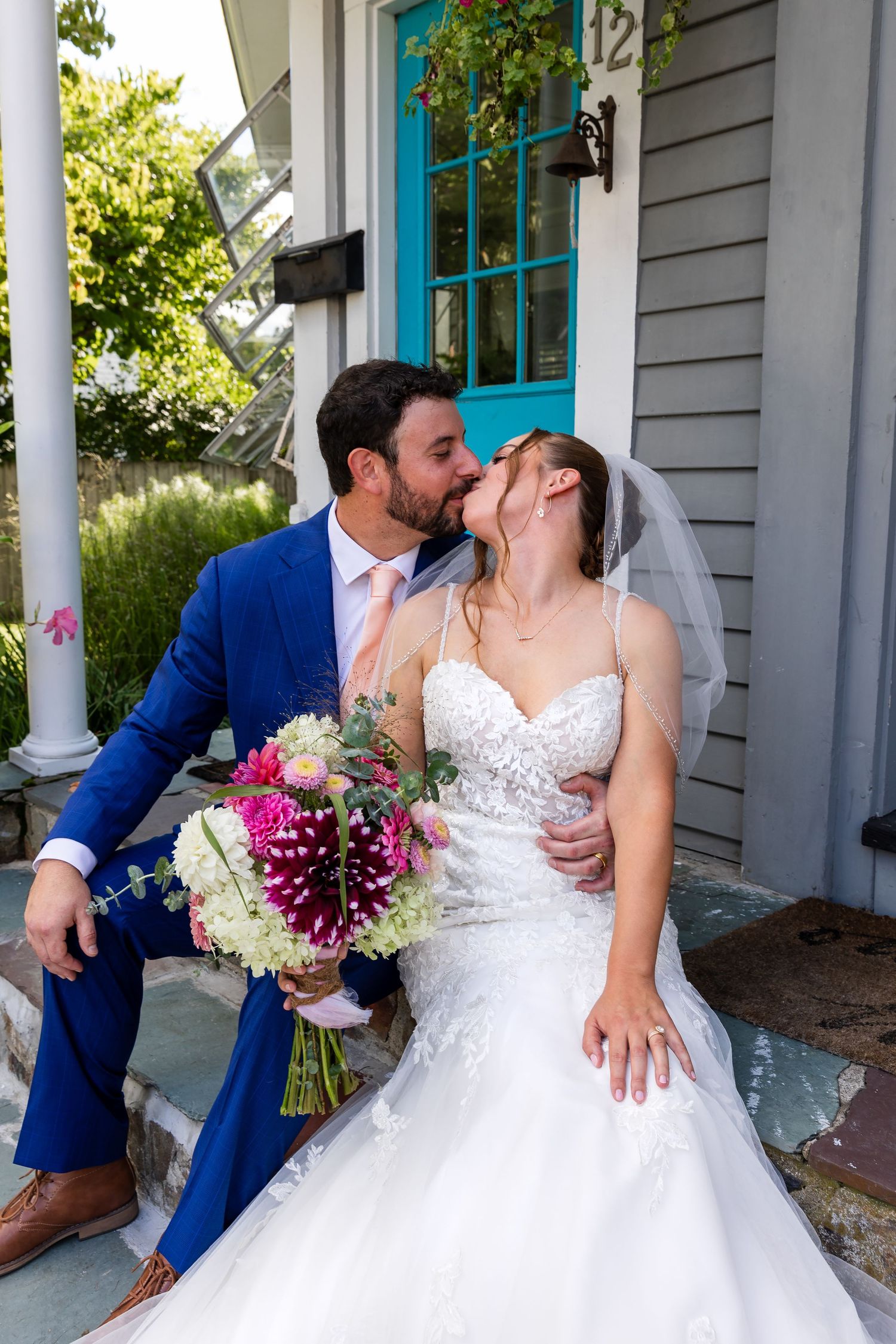 A romantic wedding moment captured in three progressive photos showing couple kissing on a front porch with blue trim.