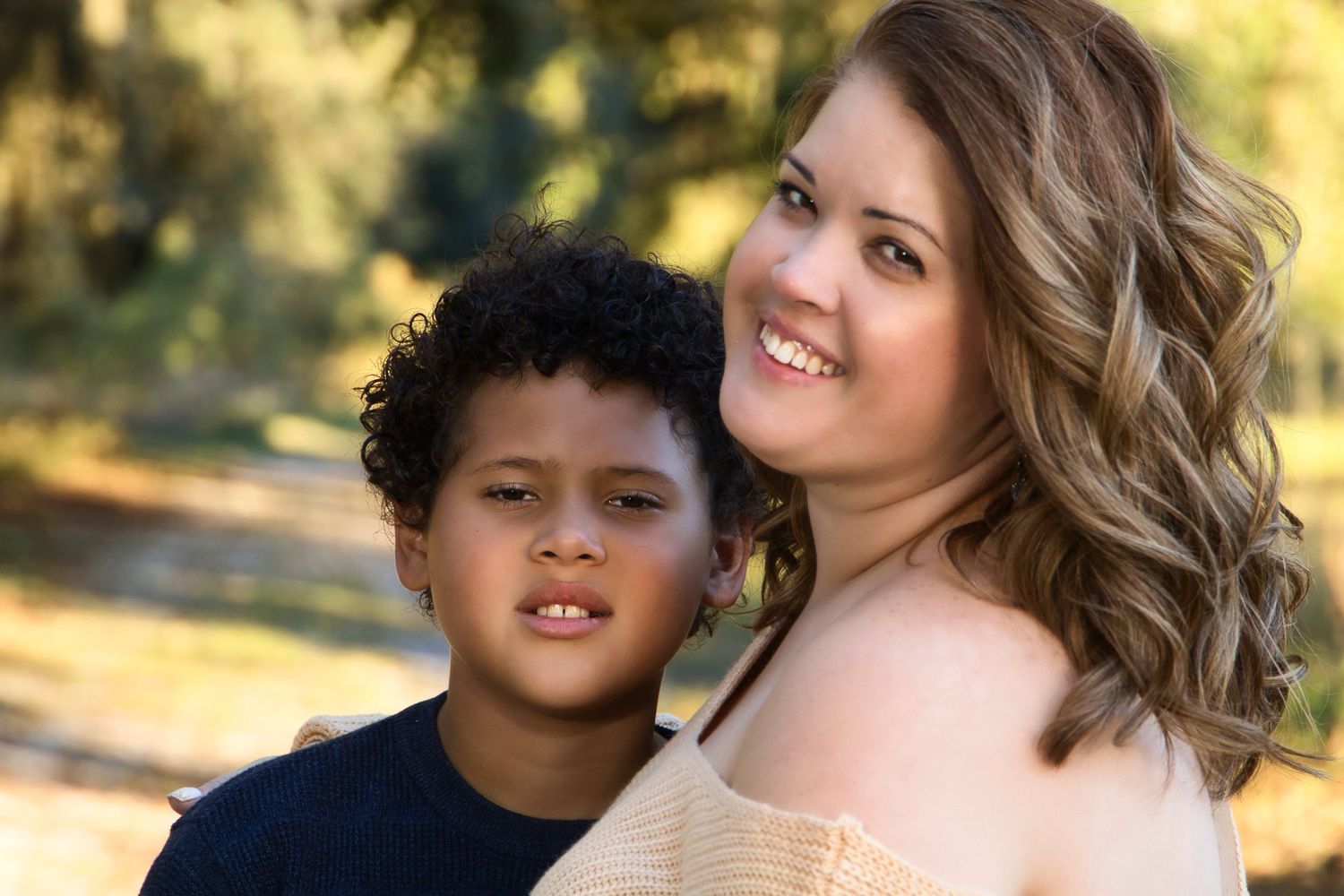 A heartwarming outdoor portrait in natural lighting.