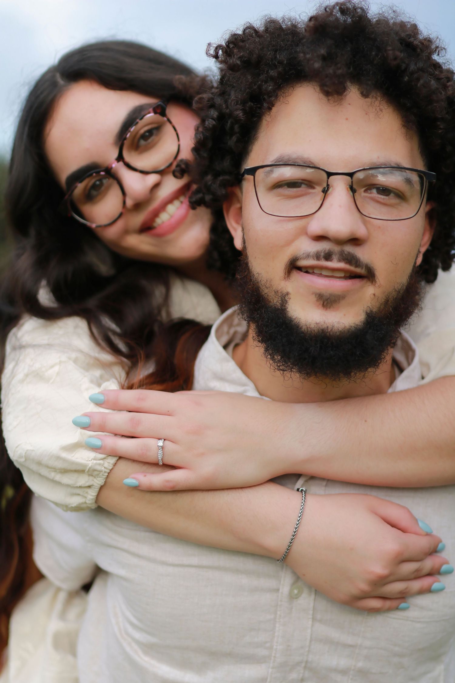 A couple embraces in a series of affectionate selfies showing their closeness and happiness together.