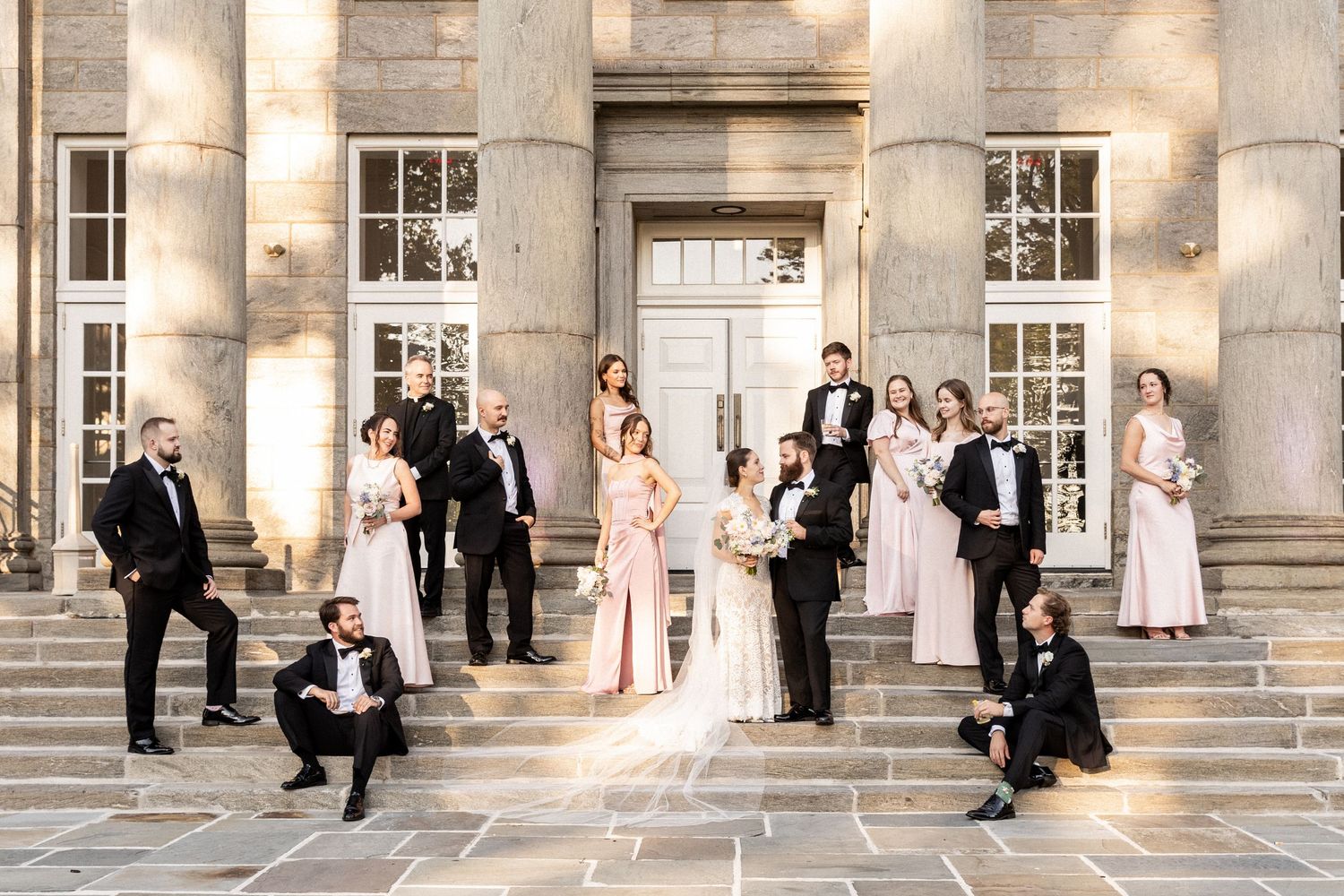 A series of elegant wedding photographs showing couples and wedding party members on stone steps of a grand building.