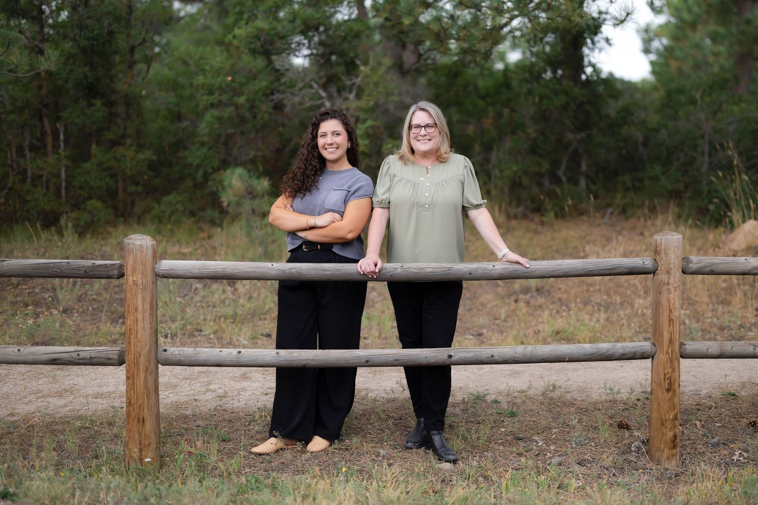 Casual outdoor portrait series with wooden fence and natural background.