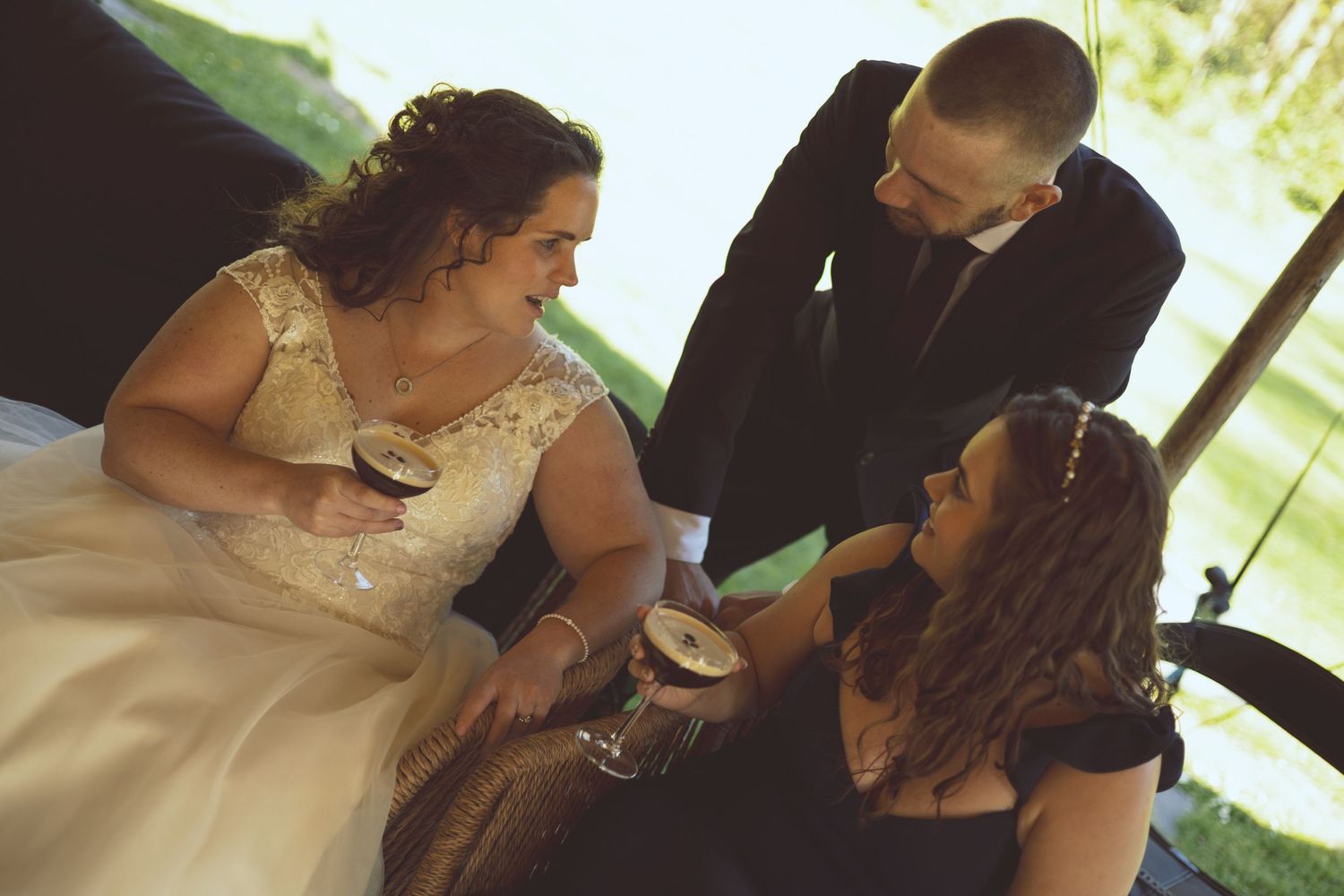 A candid moment of guests reacting during a heartfelt wedding speech