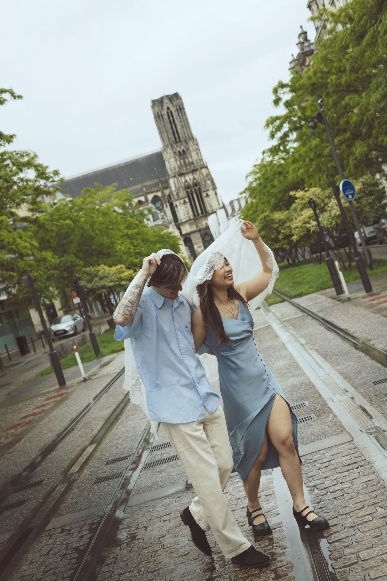 Couple holding hands during documentary-style photoshoot in the Netherlands