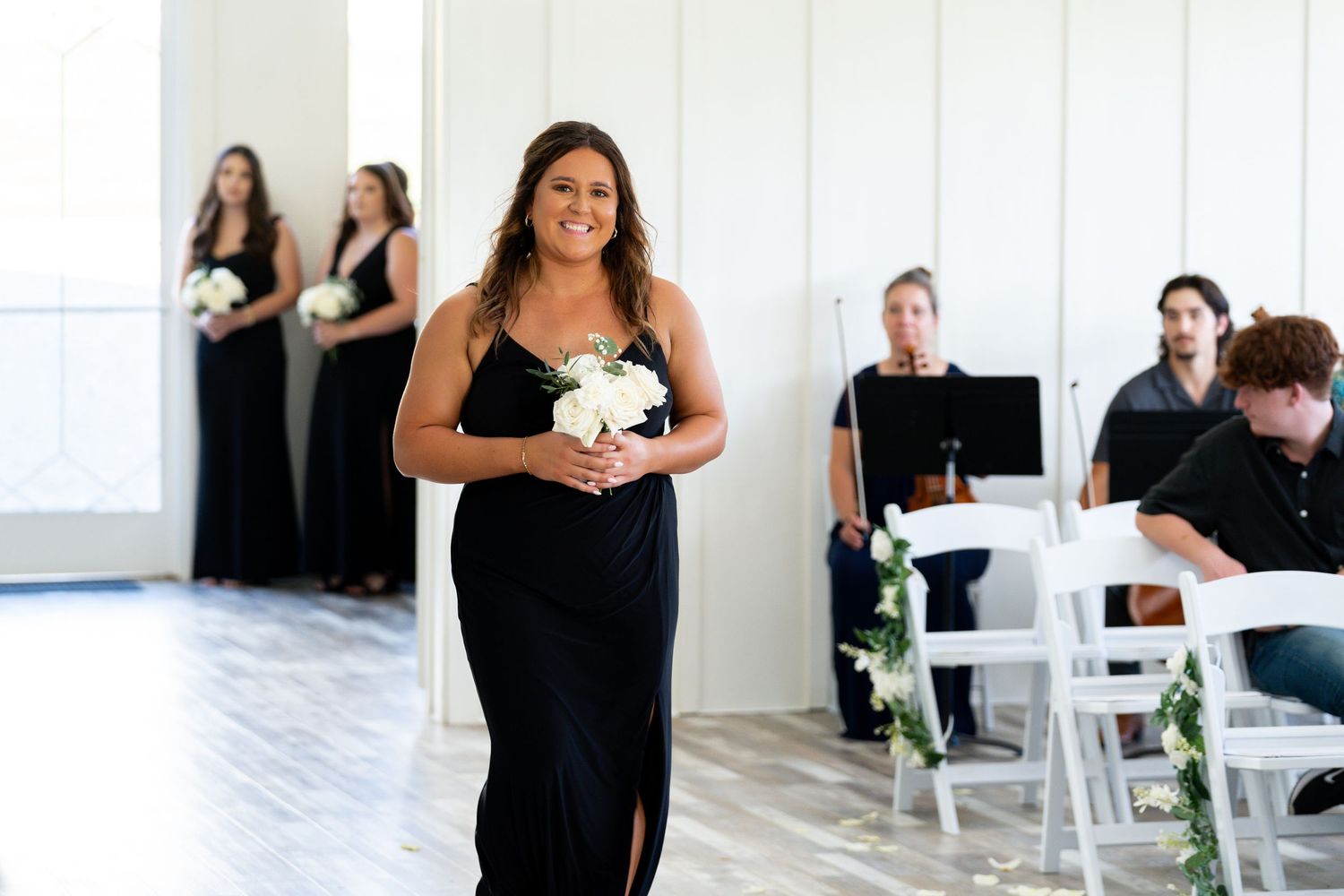A collage of wedding photos showing a bride in a black dress at different angles during a photo session.
