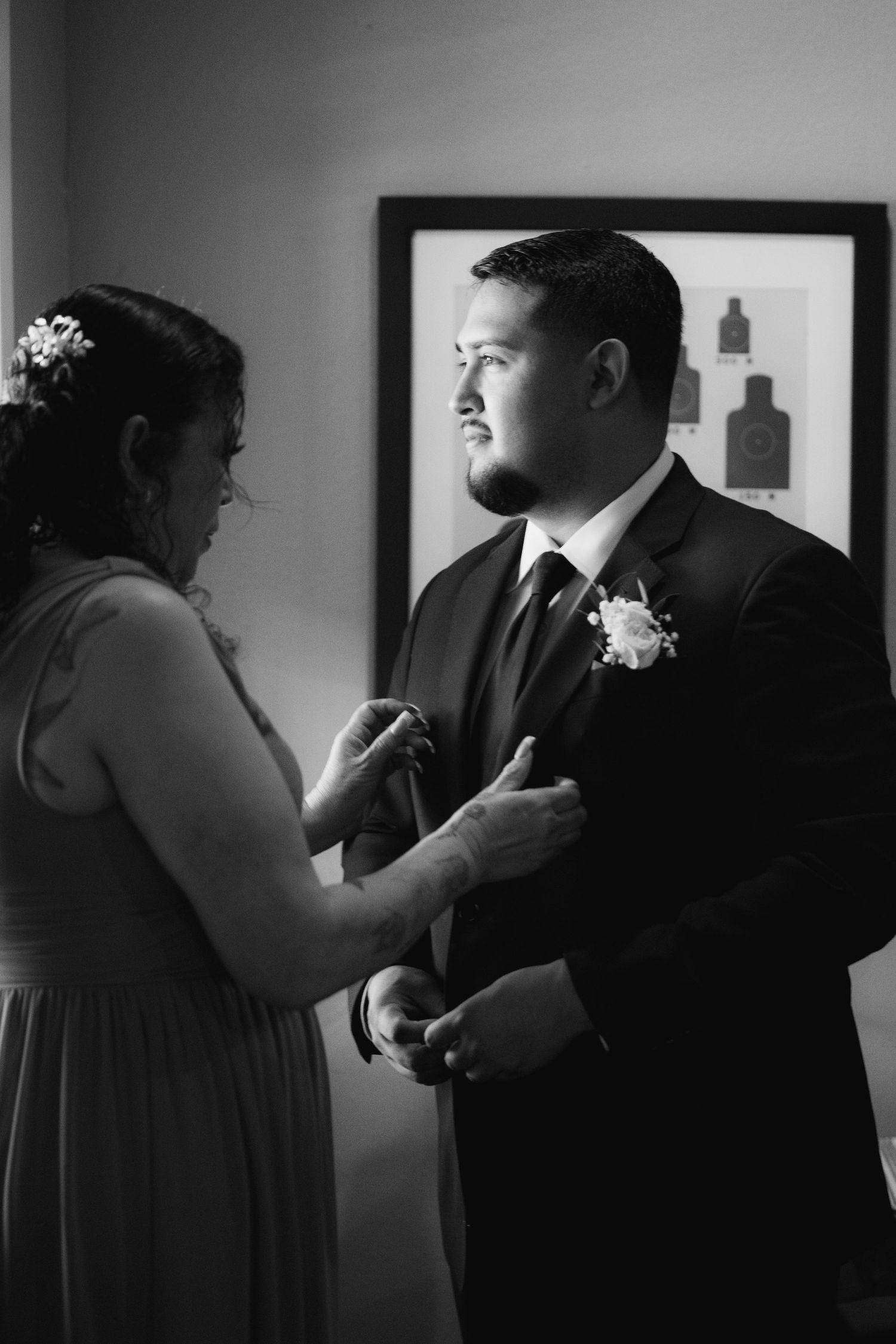 A black and white sequence of images showing a couple dancing together in an intimate moment.