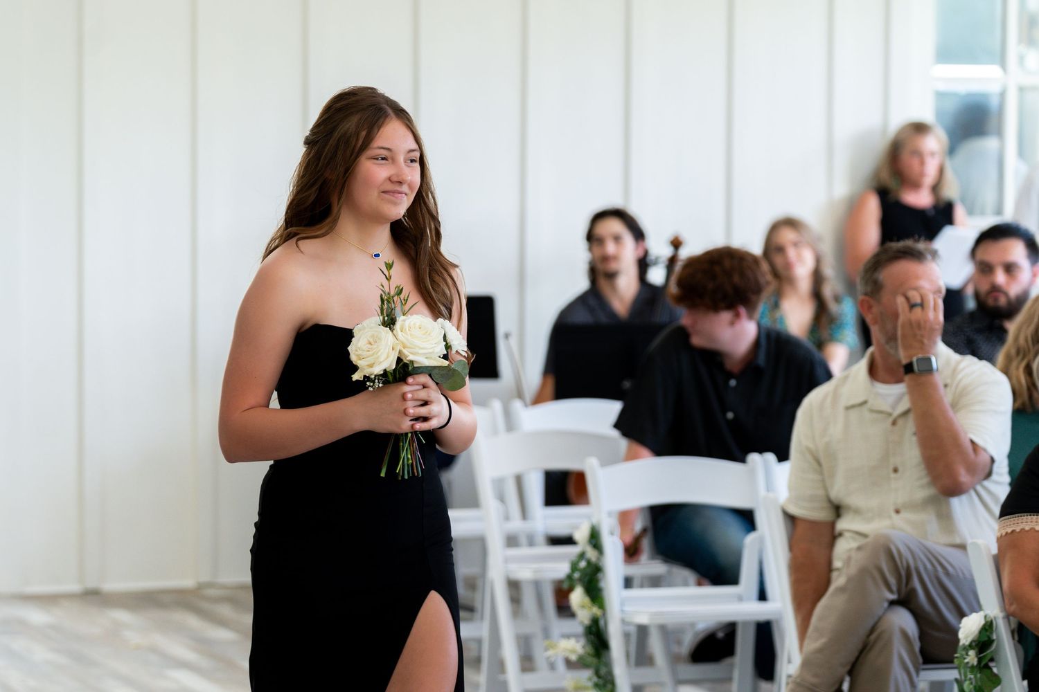 A collage of wedding reception photos showing guests socializing in an elegant white-walled space.