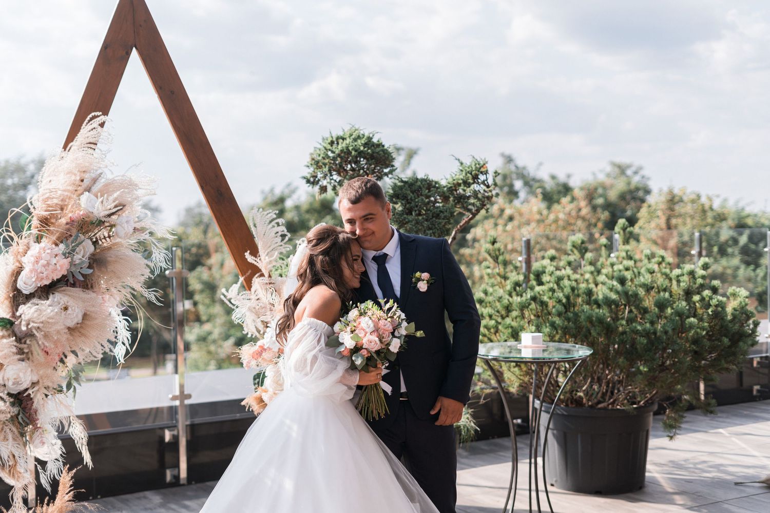 Elegant wedding ceremony collage featuring romantic outdoor moments with floral arrangements and intimate couple portraits.