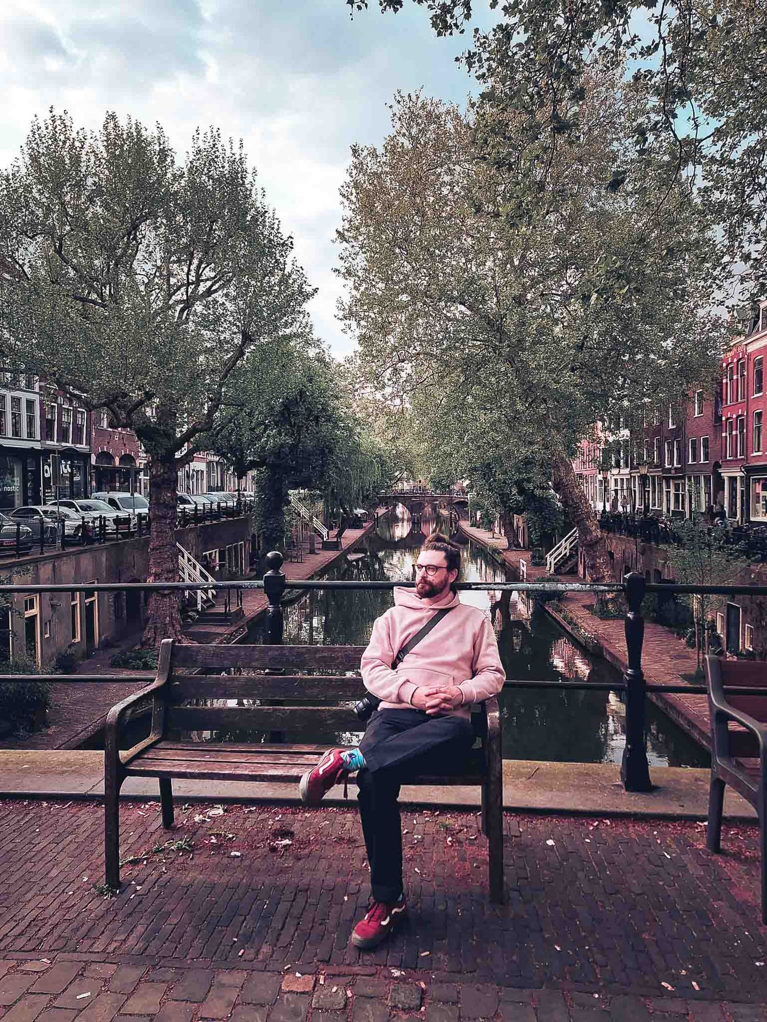man on a bench in Amsterdam
