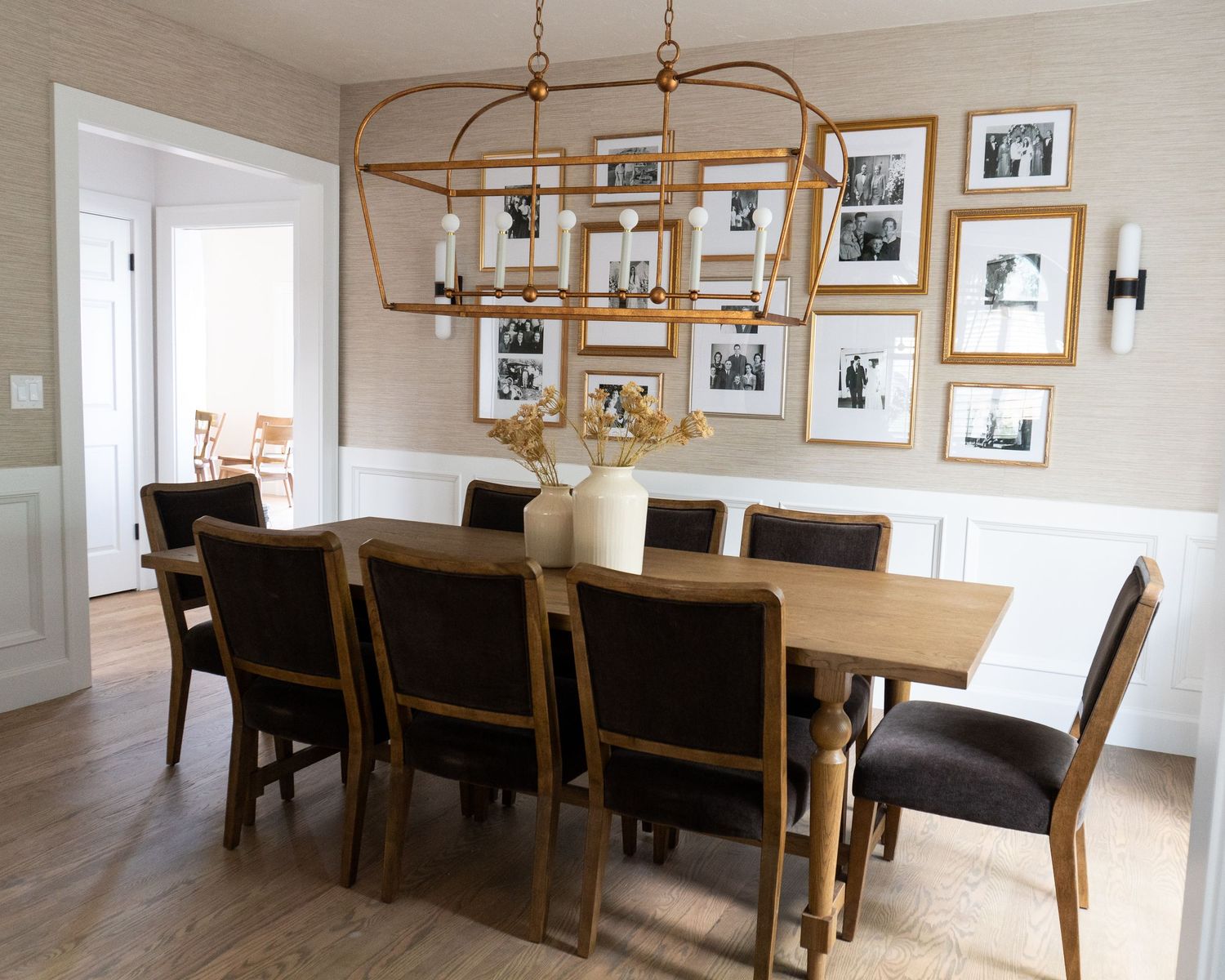 Family dining room with family as the focus with a gallery wall of ancestors